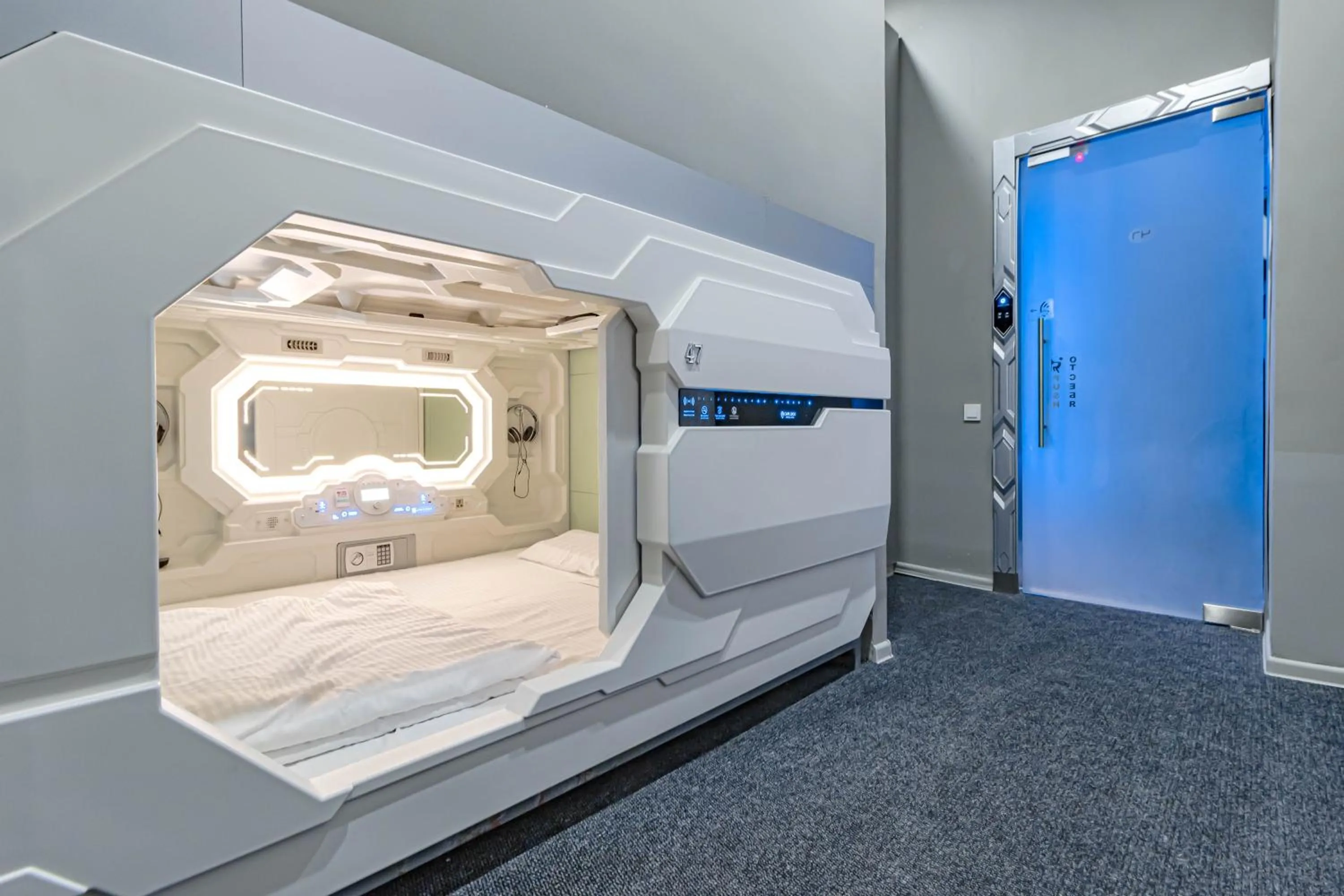 Bed in CAPS LOCK Future Hotel