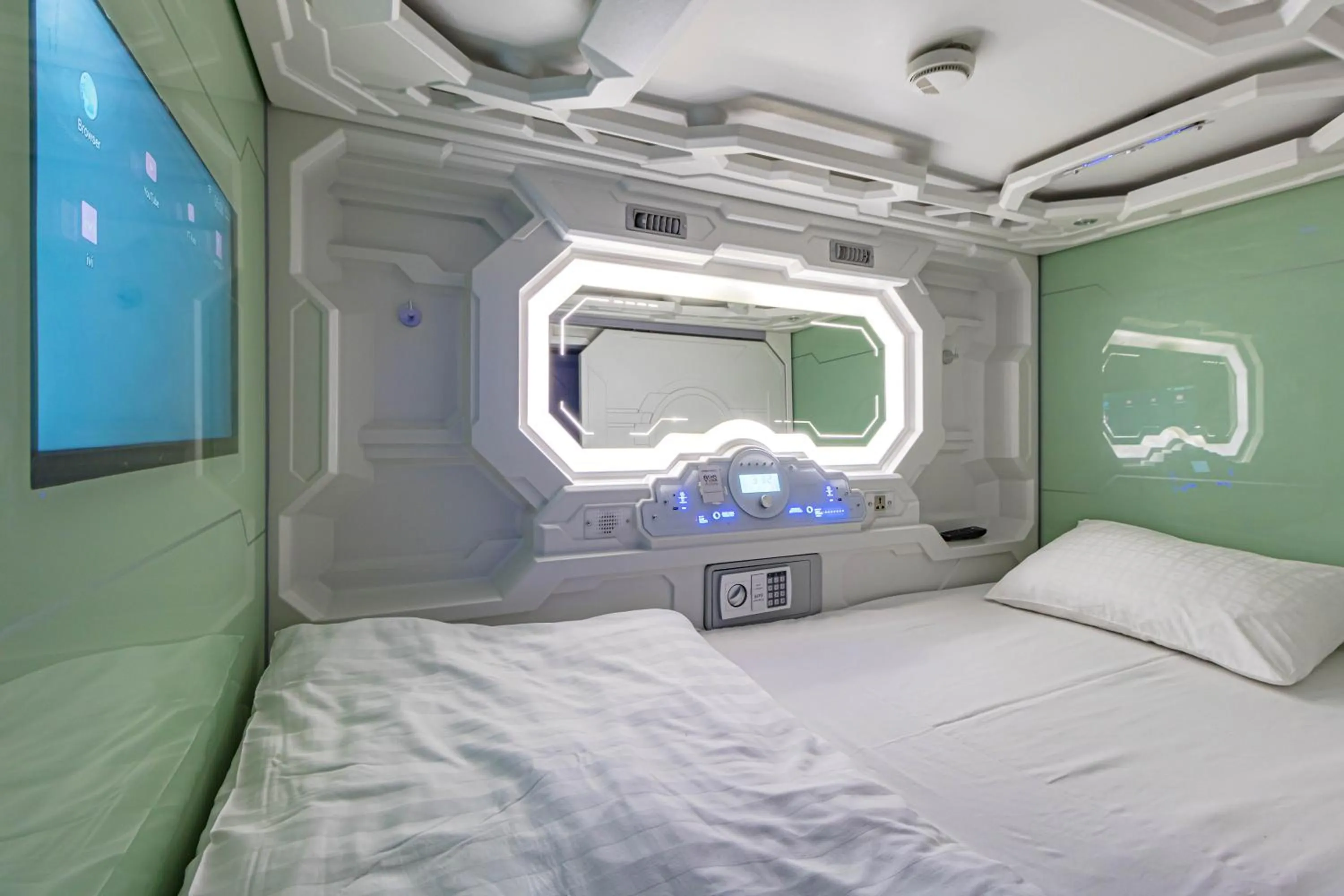 Bed in CAPS LOCK Future Hotel