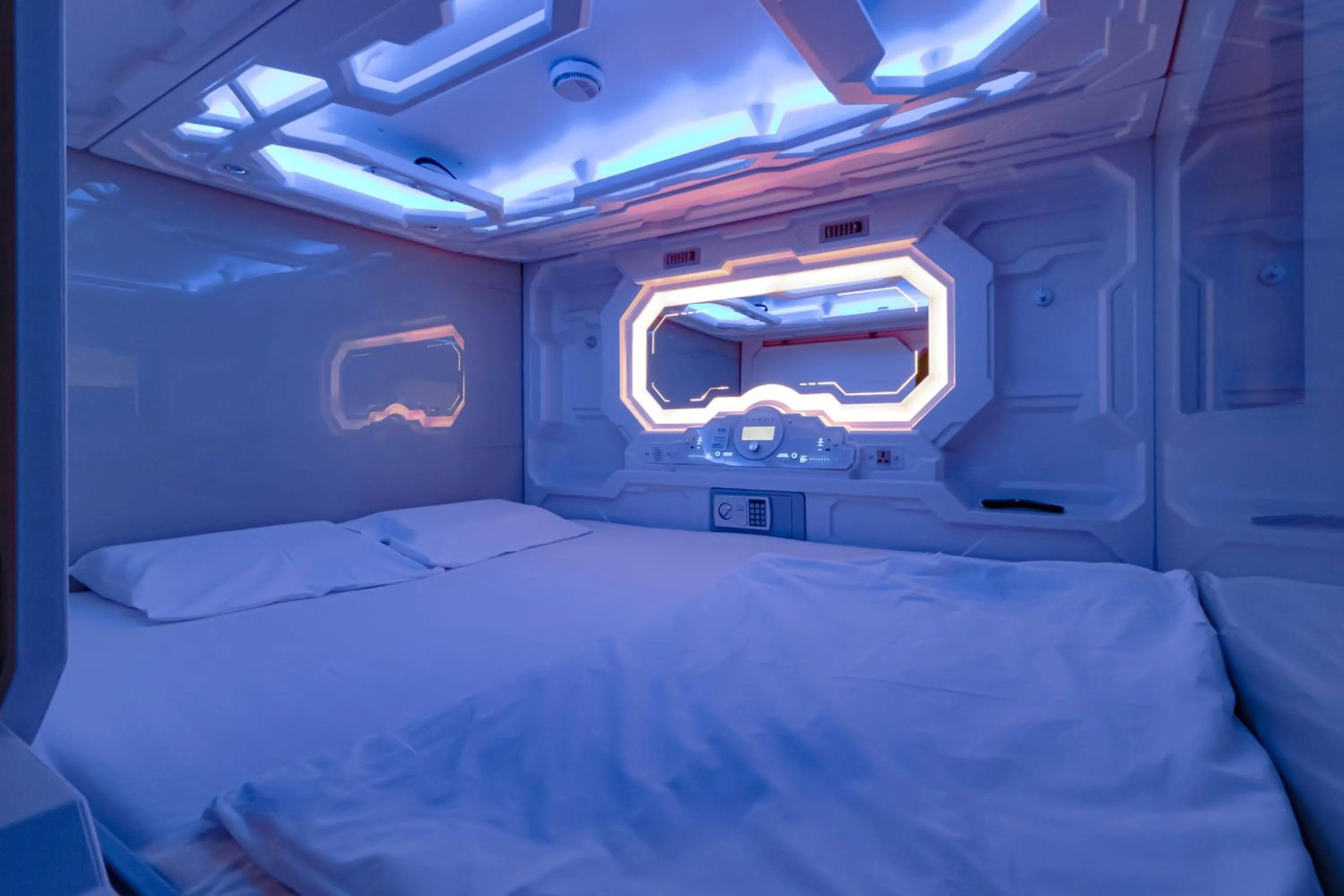 Bed in CAPS LOCK Future Hotel