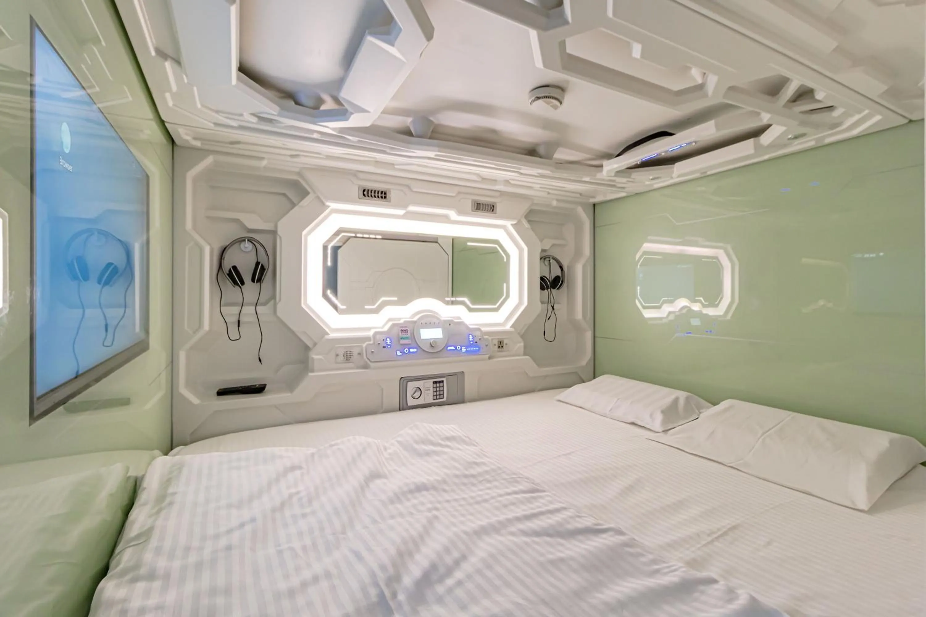 Bed in CAPS LOCK Future Hotel