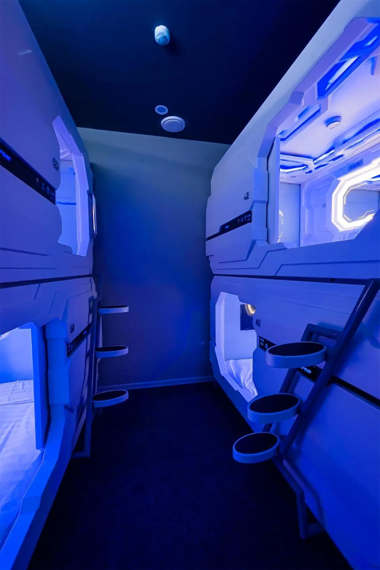 Bed in CAPS LOCK Future Hotel