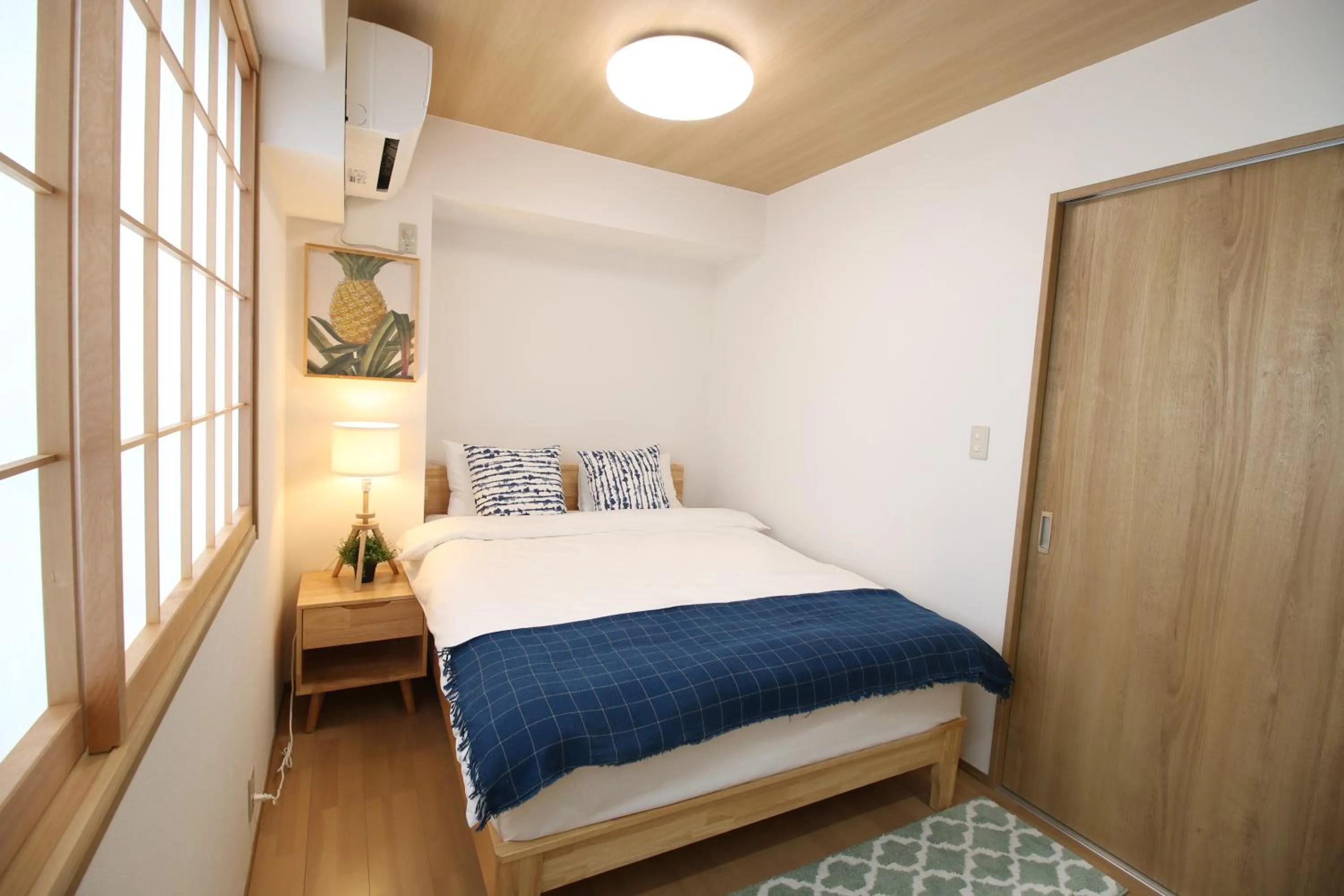 Bed in Uhome Suido Apartment SD