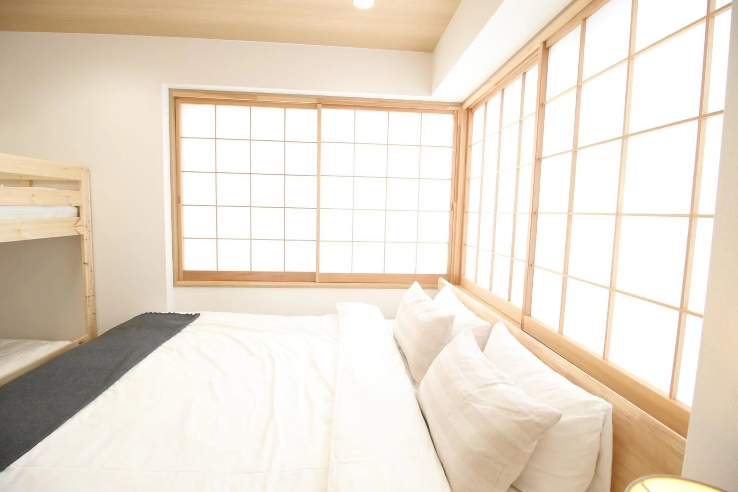 Bed in Uhome Suido Apartment SD