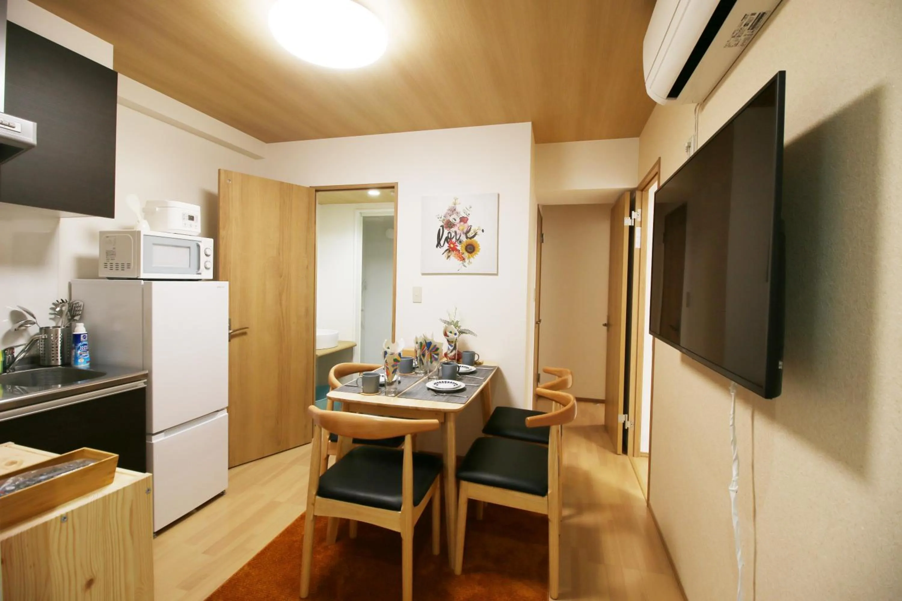 TV and multimedia in Uhome Suido Apartment SD
