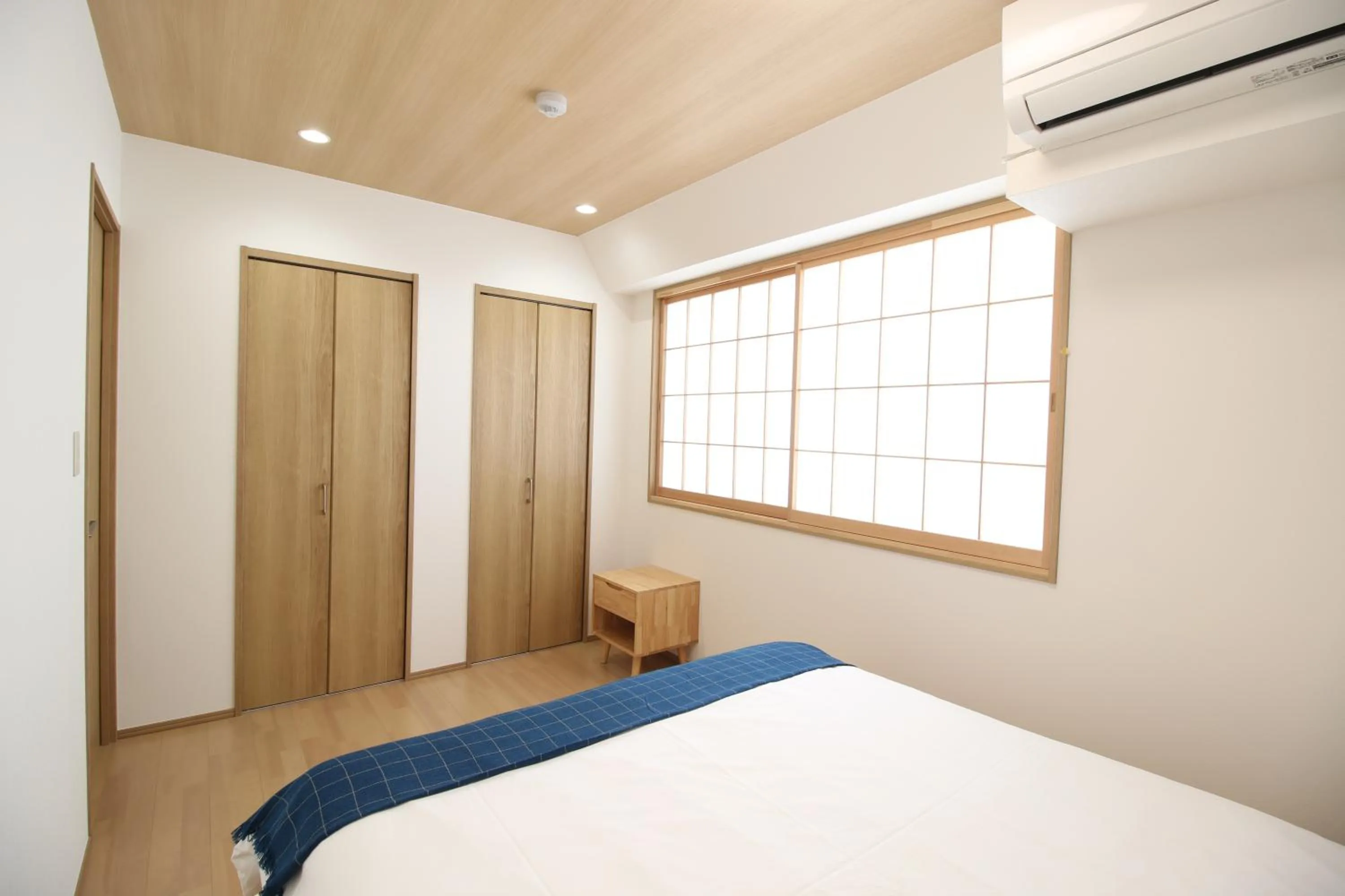 Bed in Uhome Suido Apartment SD