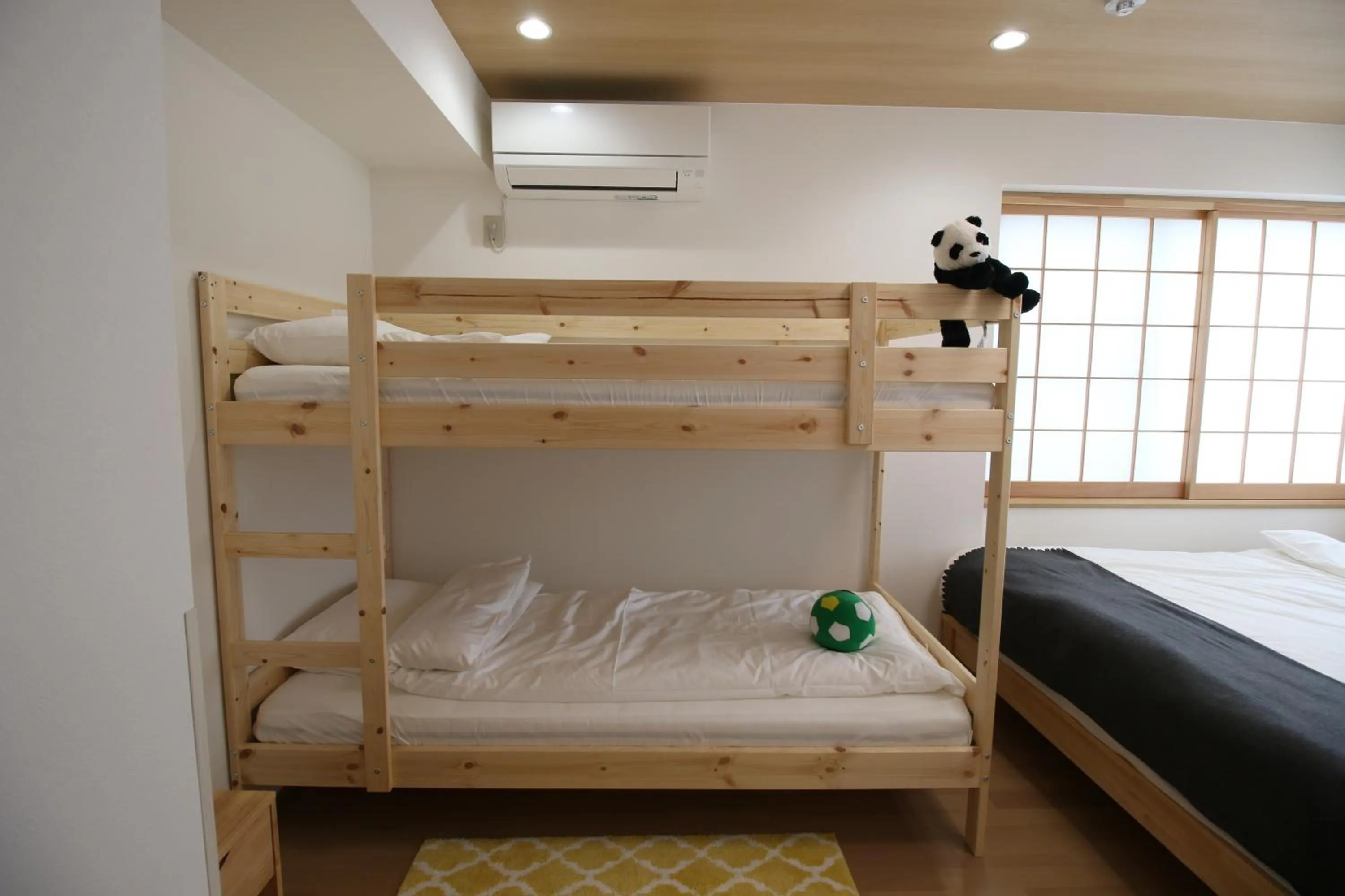 Bed in Uhome Suido Apartment SD