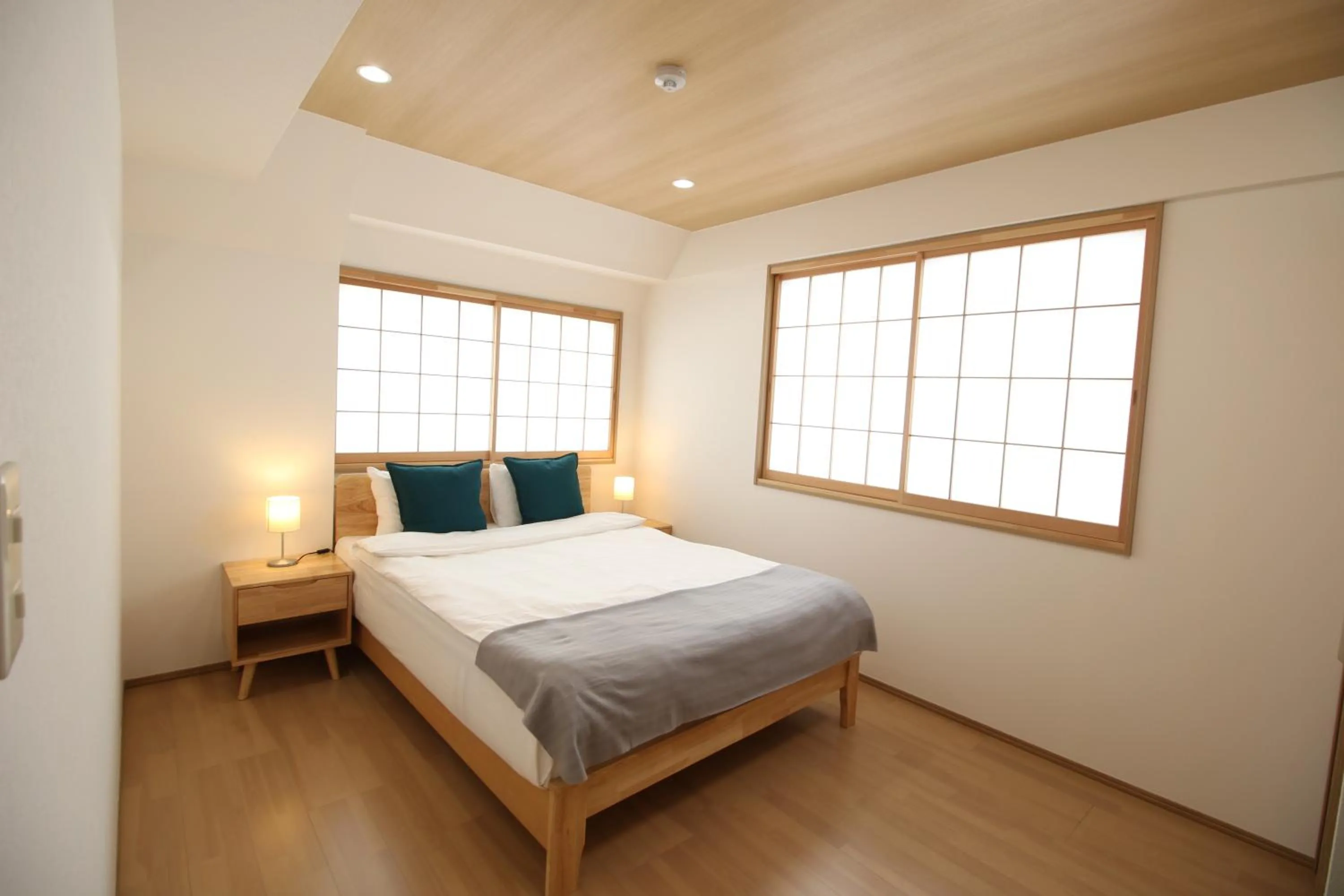 Bed in Uhome Suido Apartment SD