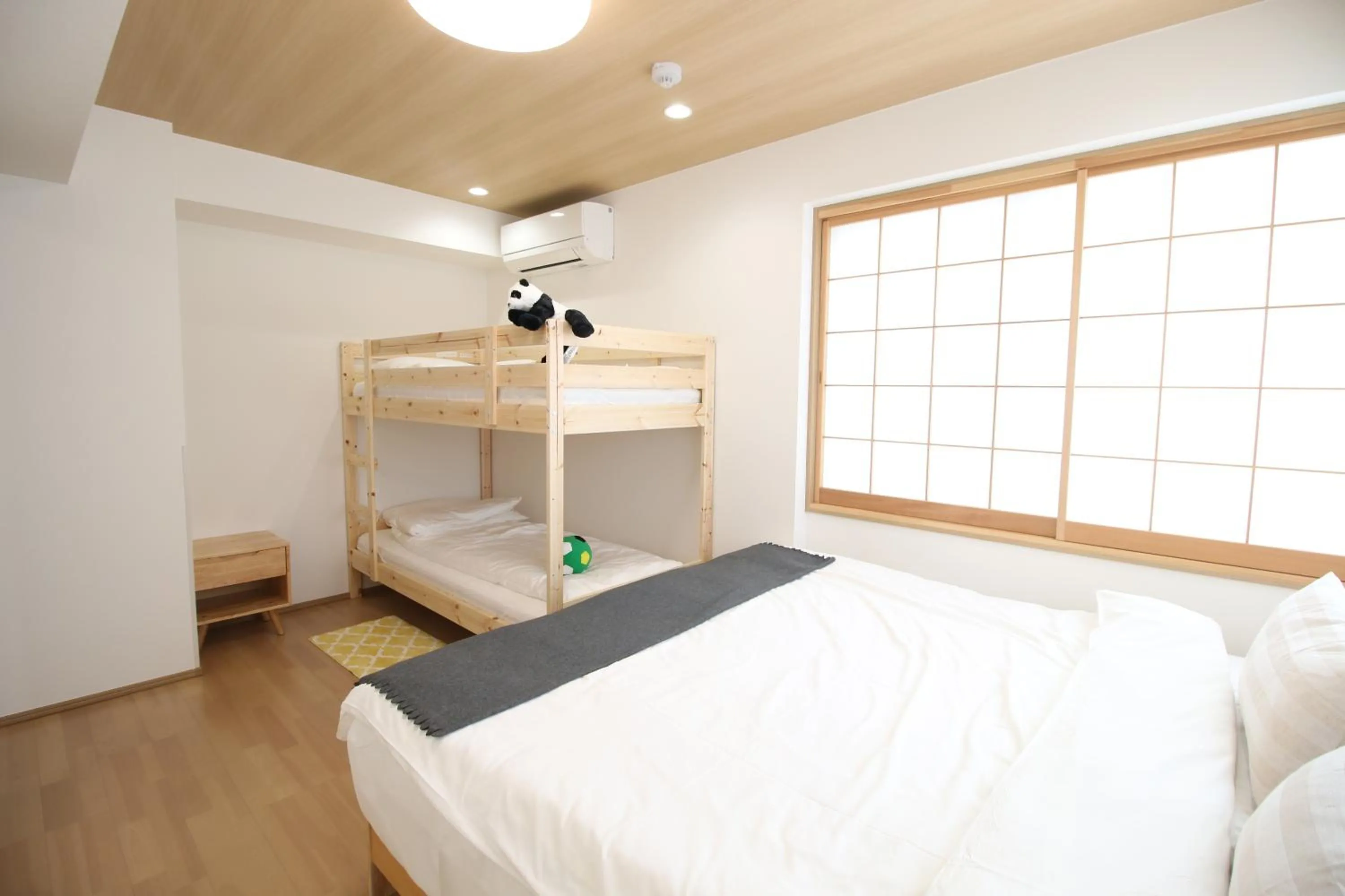 Bed in Uhome Suido Apartment SD