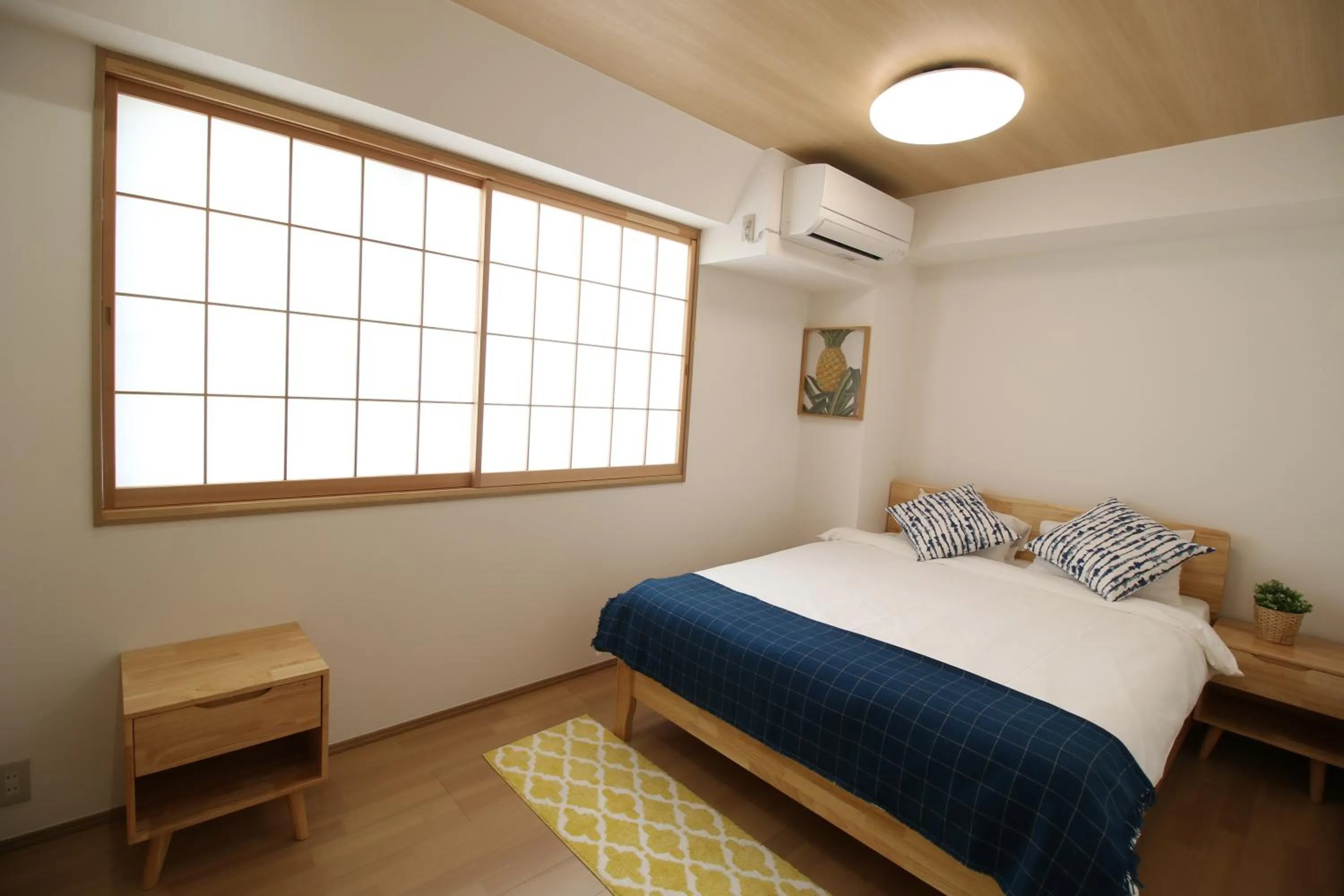 Bed in Uhome Suido Apartment SD