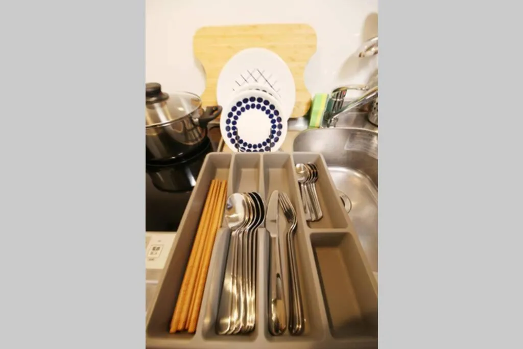 Kitchen or kitchenette in Uhome Suido Apartment SD