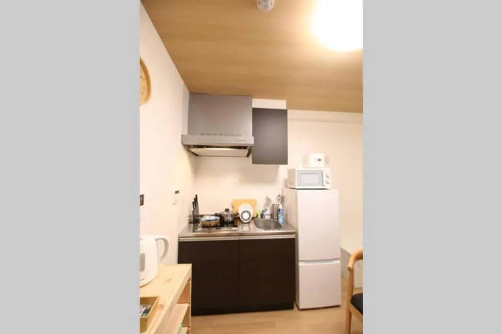 Kitchen or kitchenette in Uhome Suido Apartment SD