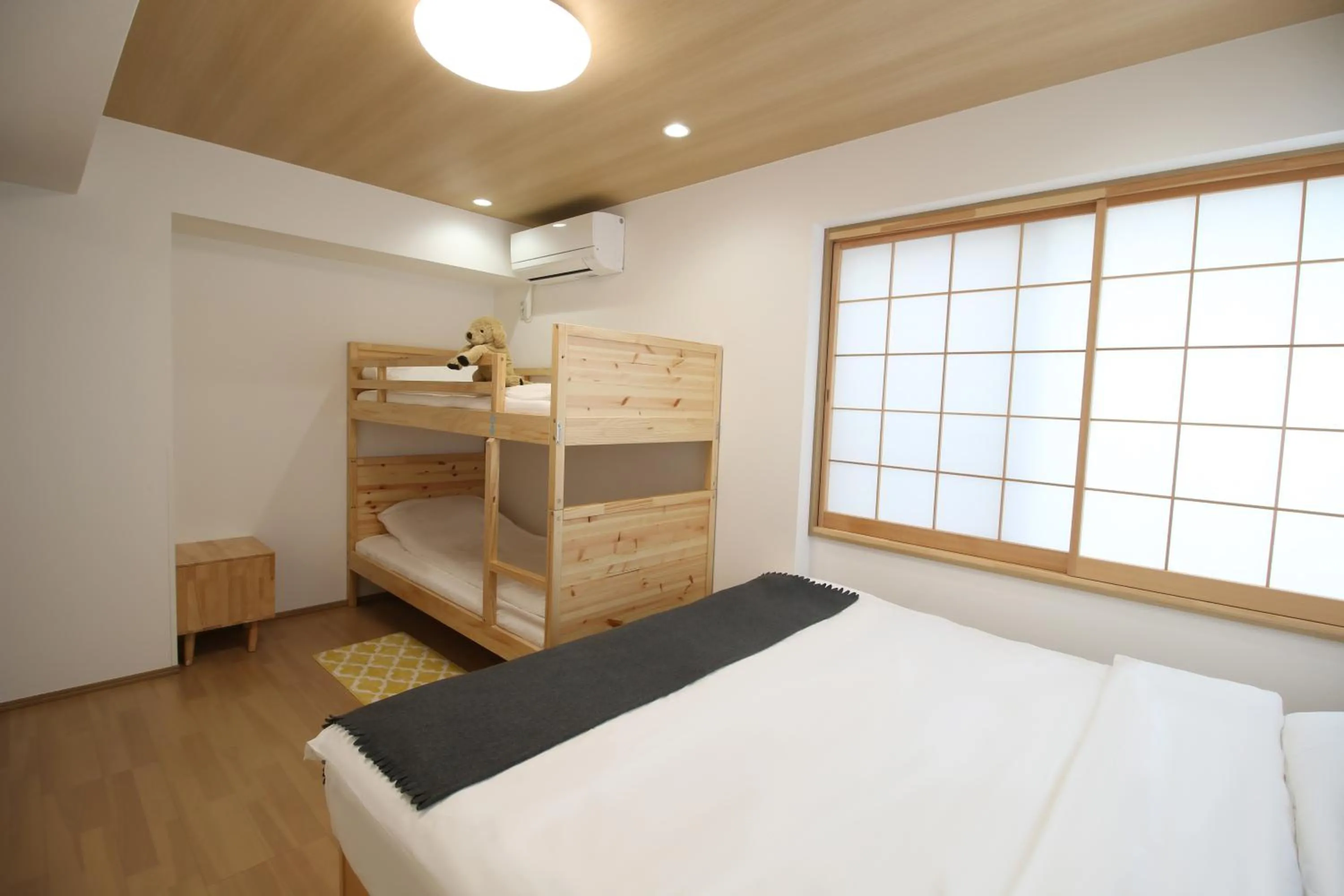 Bed in Uhome Suido Apartment SD