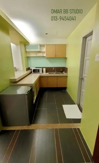 Kitchen or kitchenette in OMAR BB STUDIO