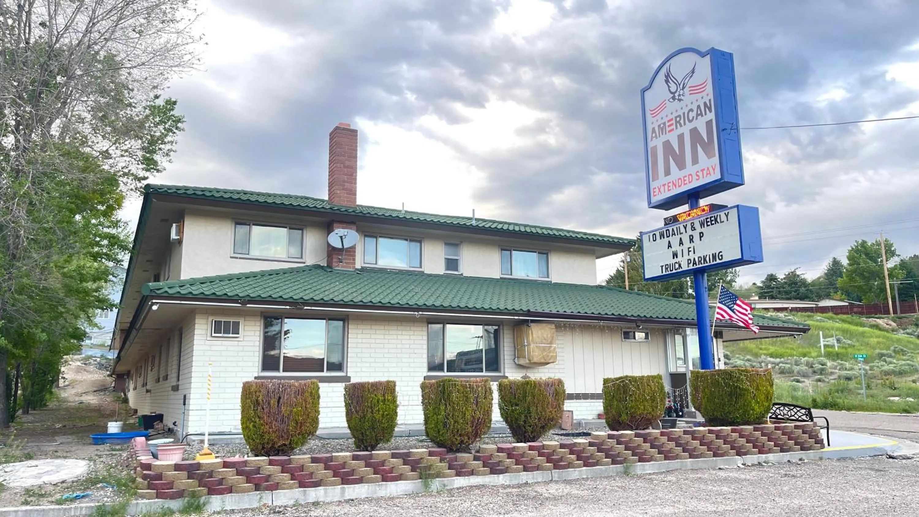 Property logo or sign in American inn