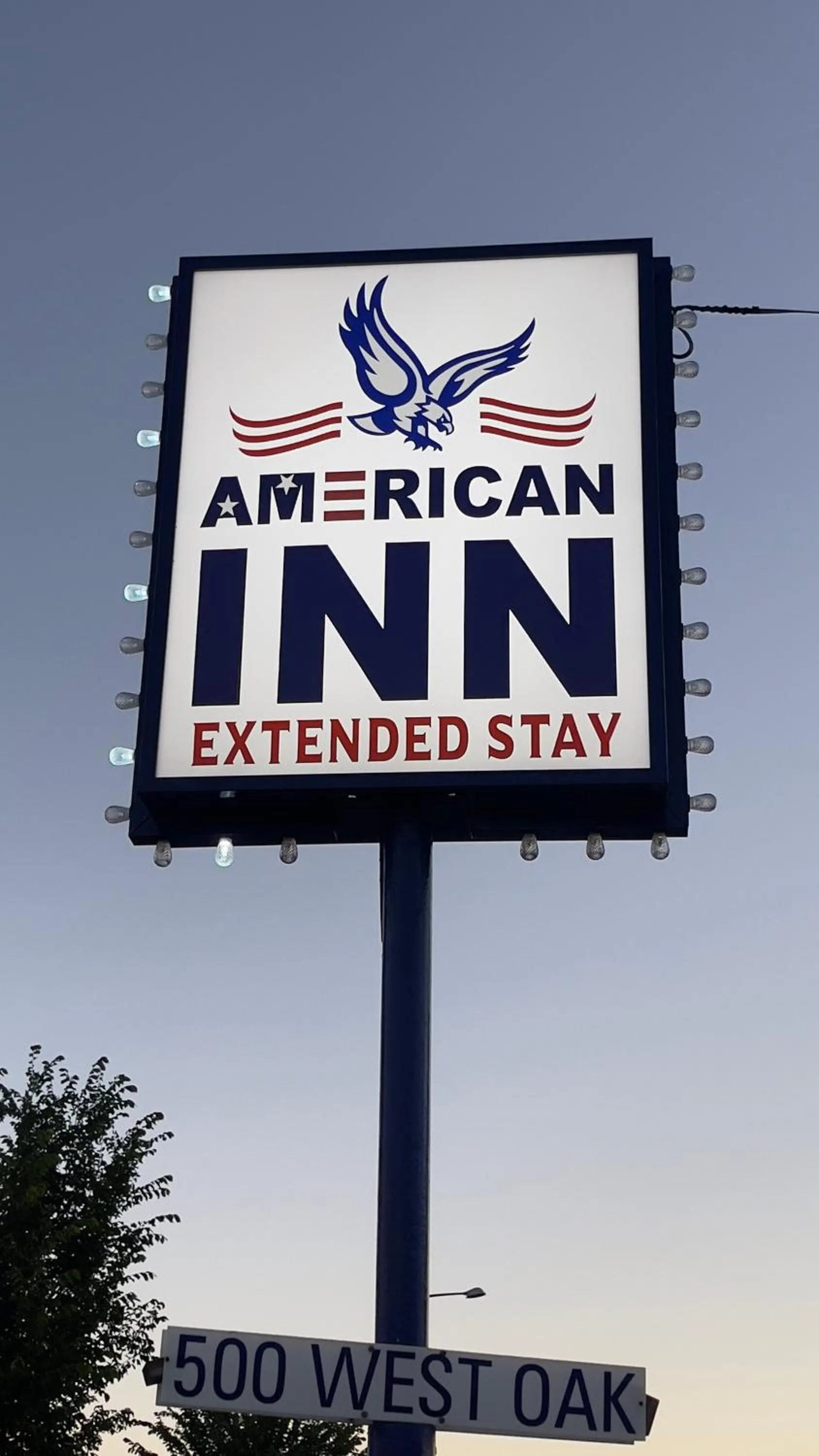 Property logo or sign in American inn