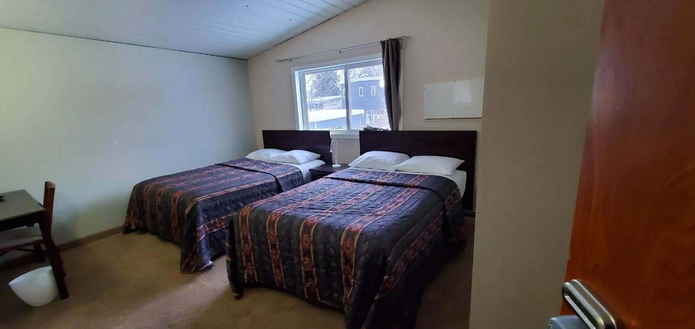 Bed in BUDGET LODGE