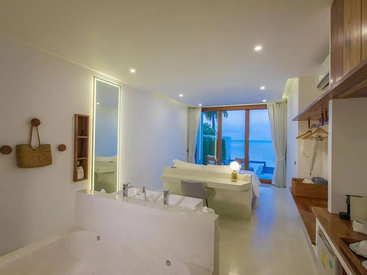 Living room in White Whale Beachfront Pool Villa Living room in White Whale Beachfront Pool Villa