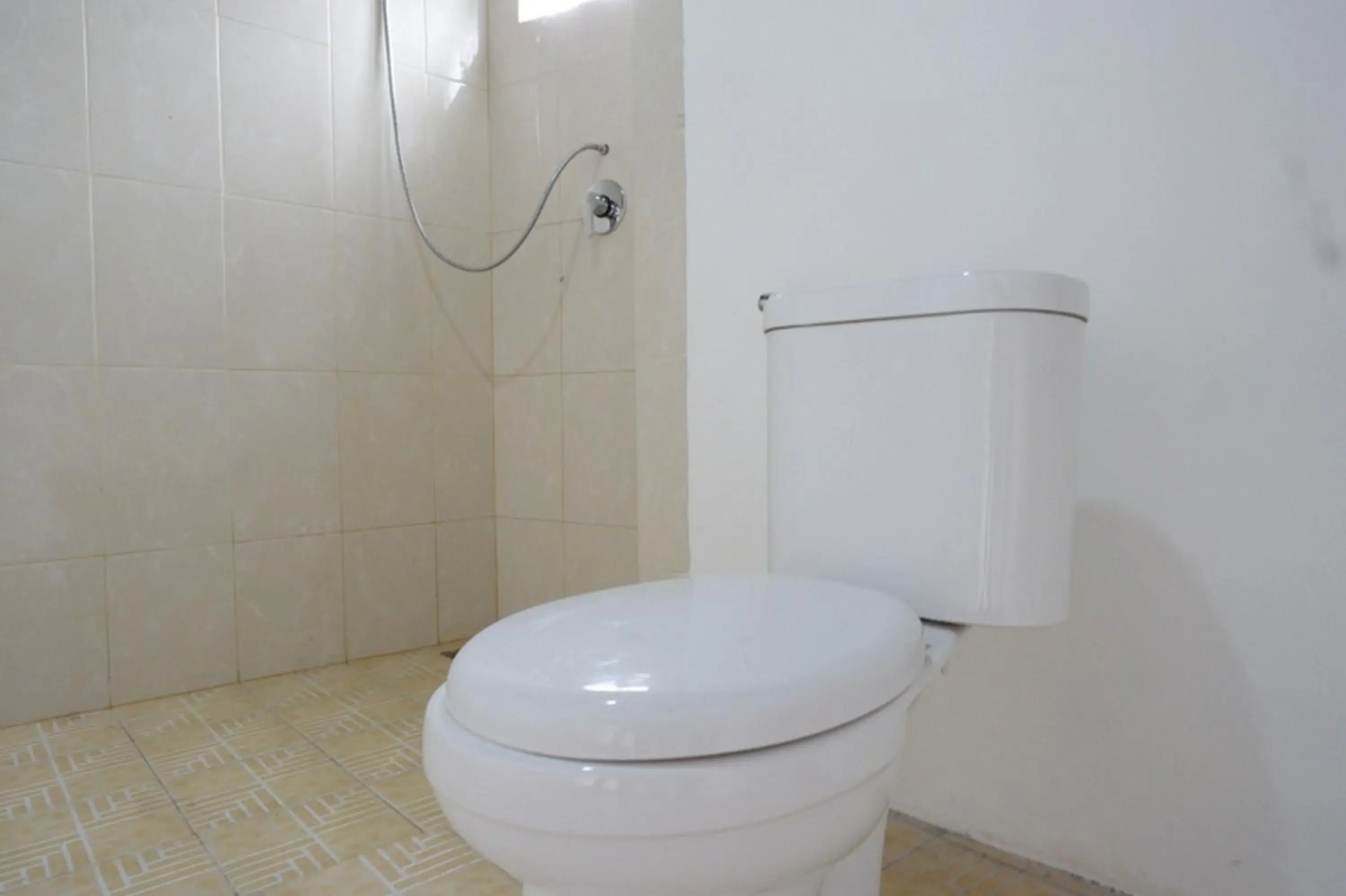 Bathroom in RedDoorz @ Demangan Sari Residence