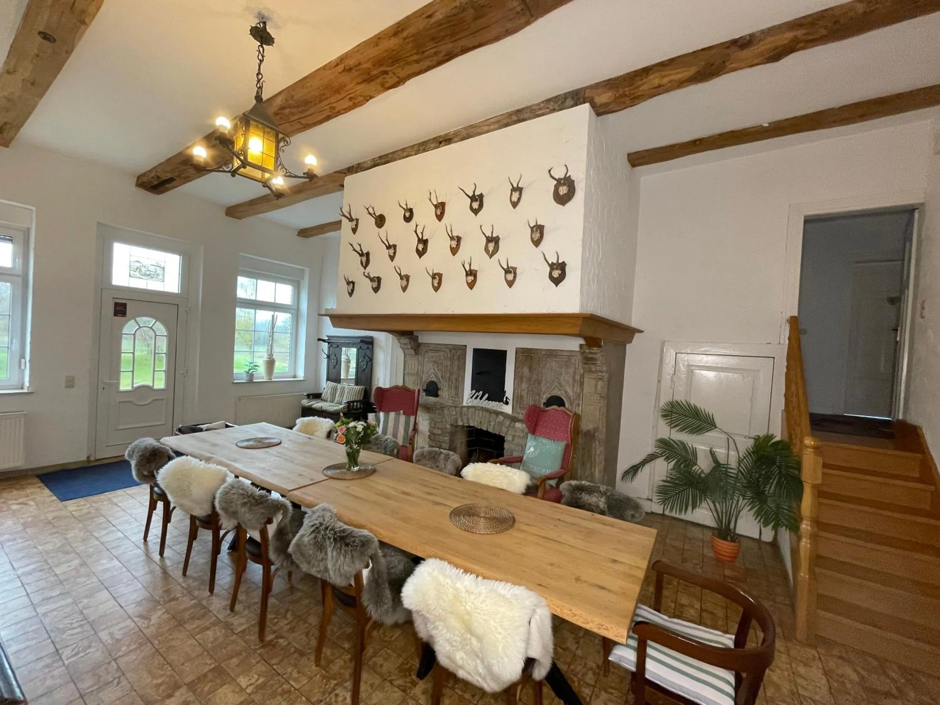 Communal lounge/ TV room in Landhaus Holthausen