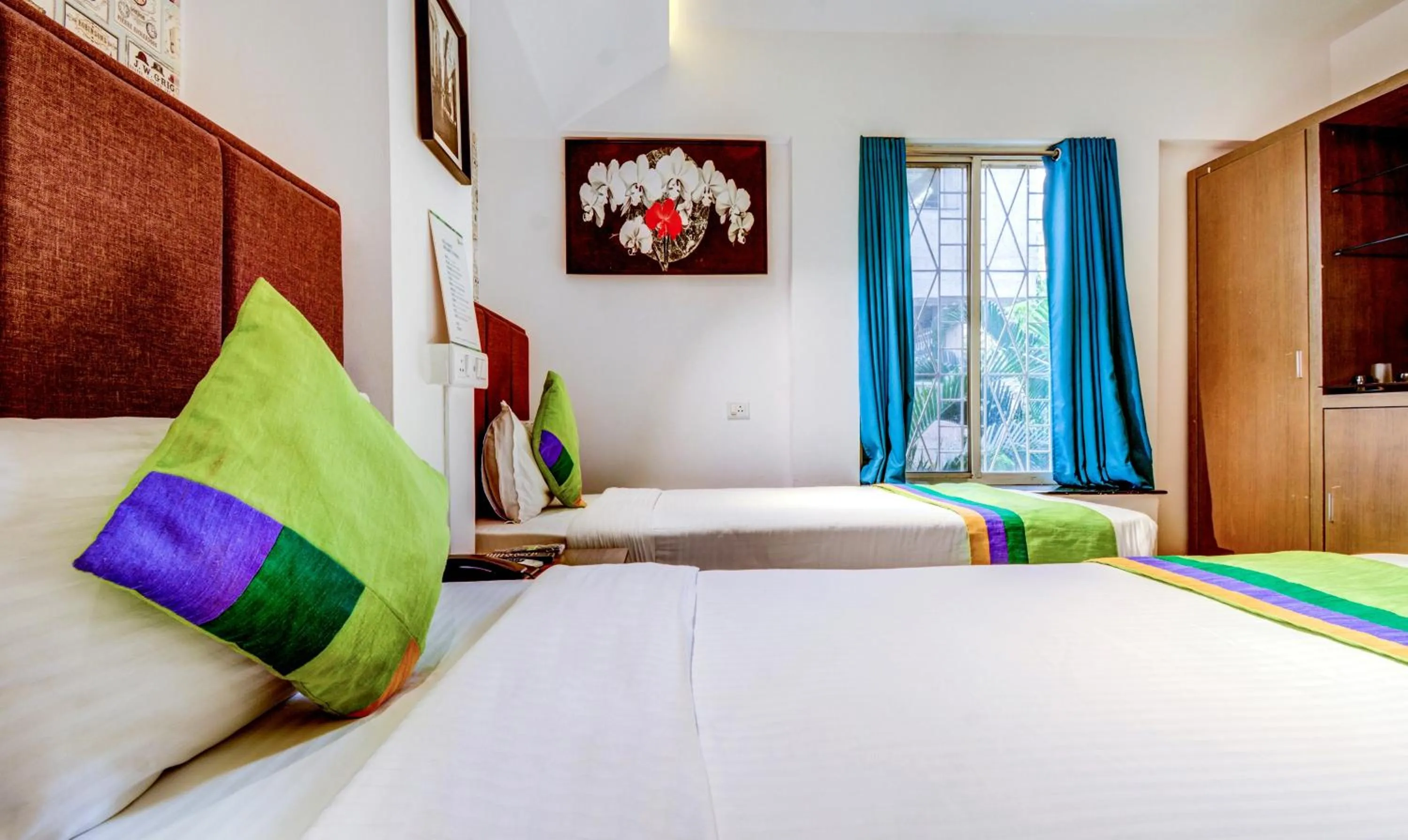 Bedroom, Bed in Treebo Iris Suites