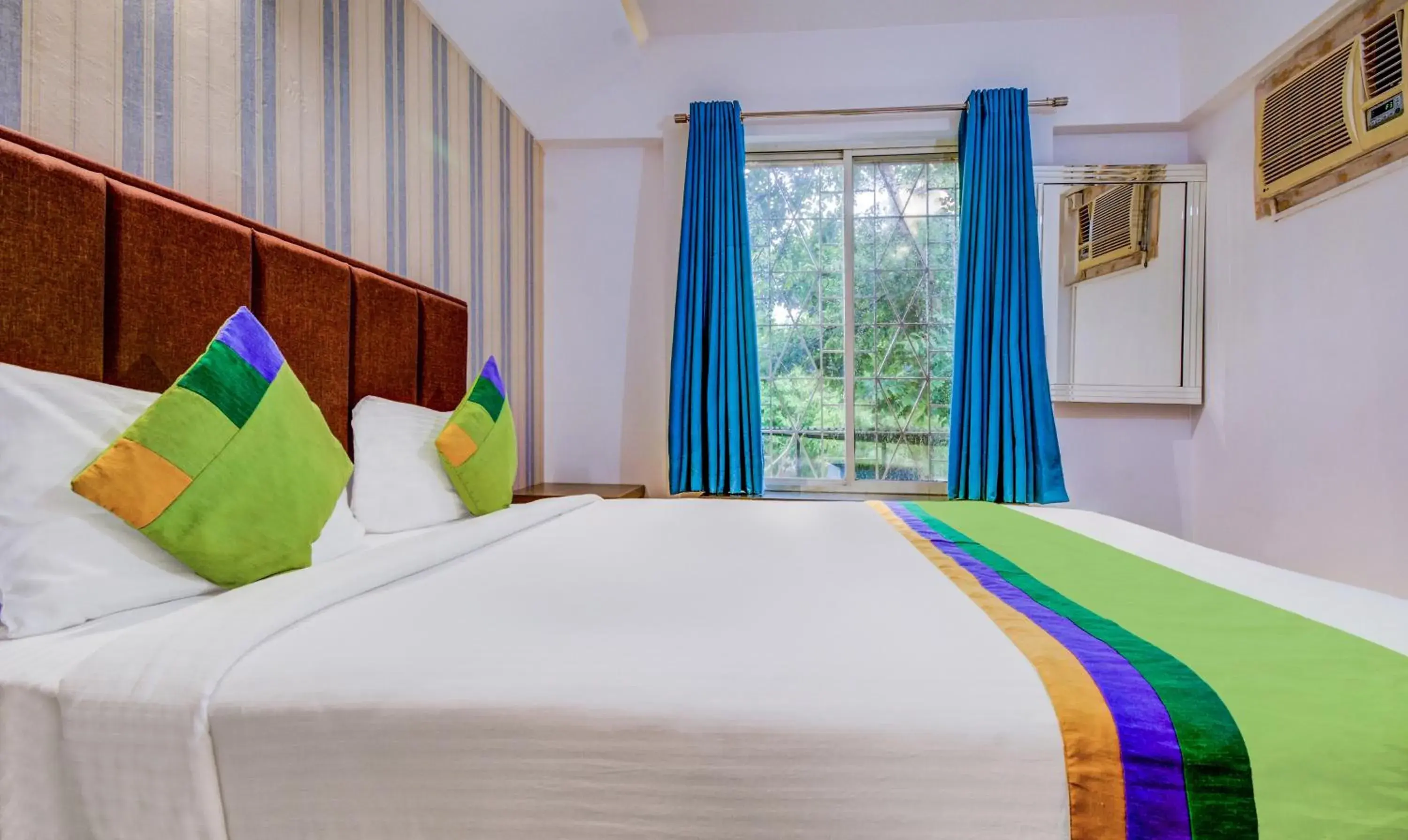 Bedroom, Bed in Treebo Iris Suites Bedroom, Bed in Treebo Iris Suites