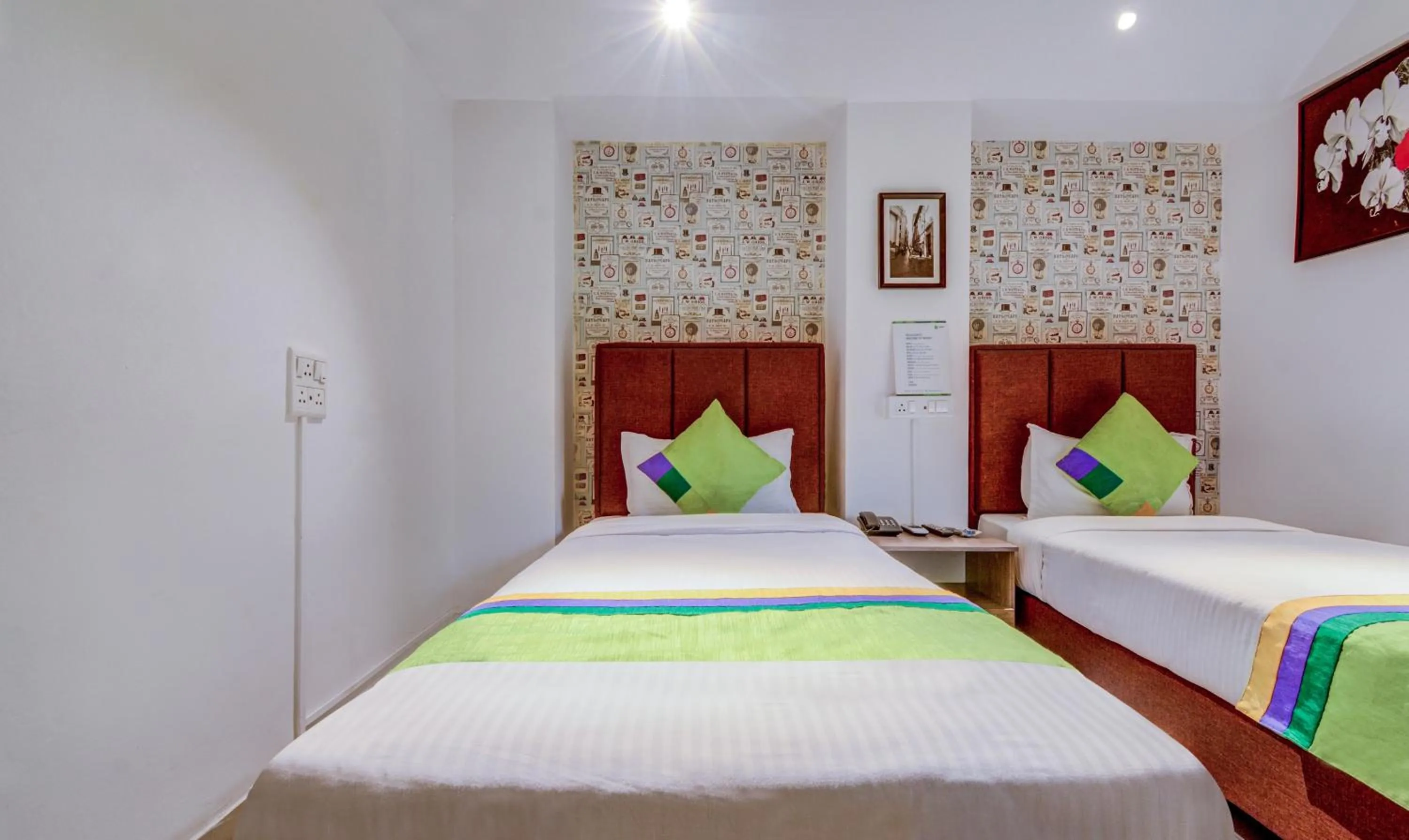 Bedroom, Bed in Treebo Iris Suites