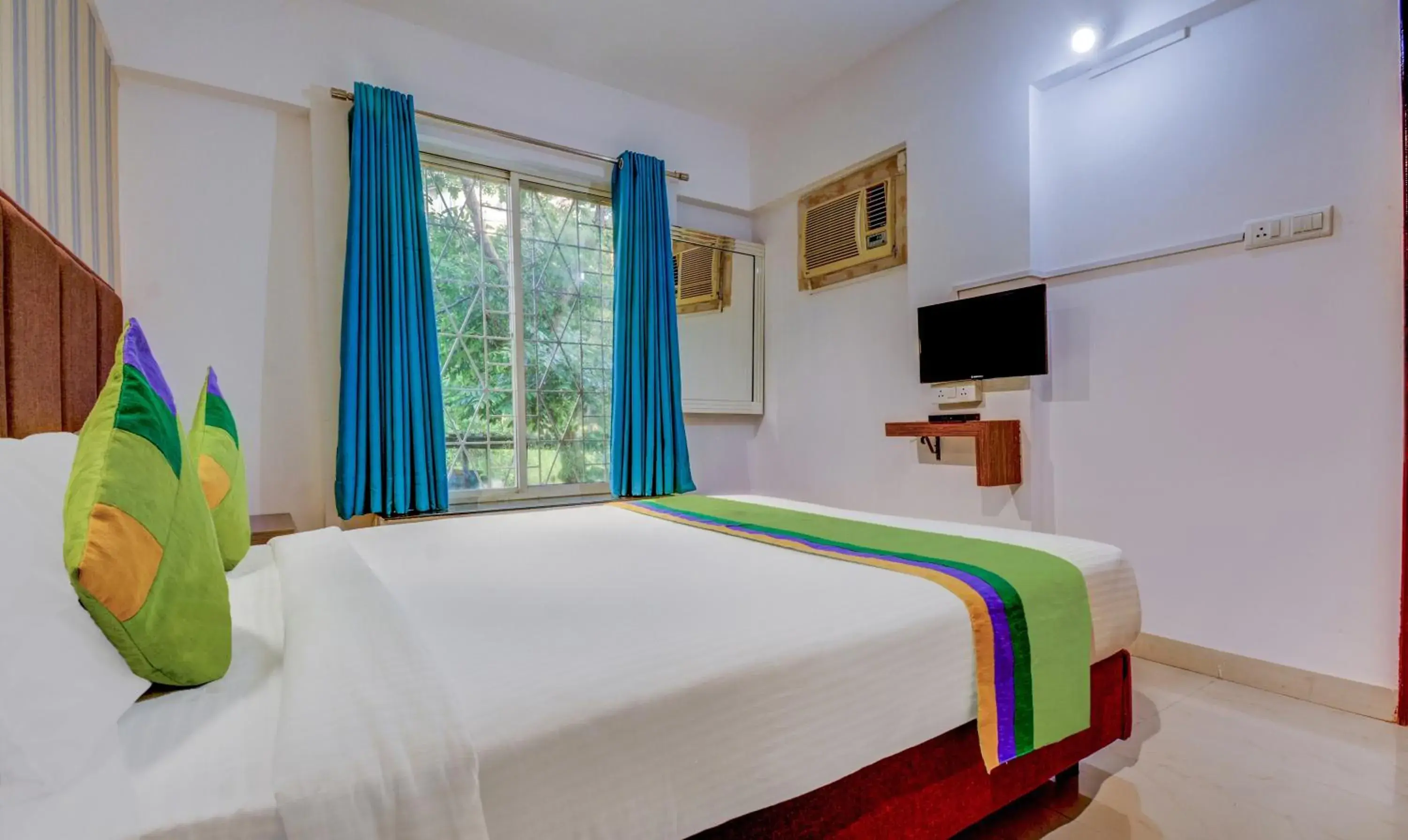 Bedroom, Bed in Treebo Iris Suites Bedroom, Bed in Treebo Iris Suites