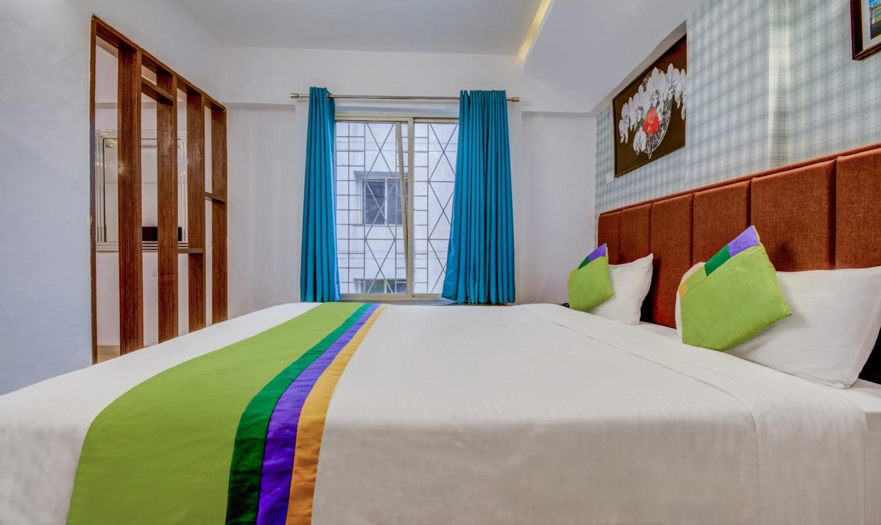 Bedroom, Bed in Treebo Iris Suites