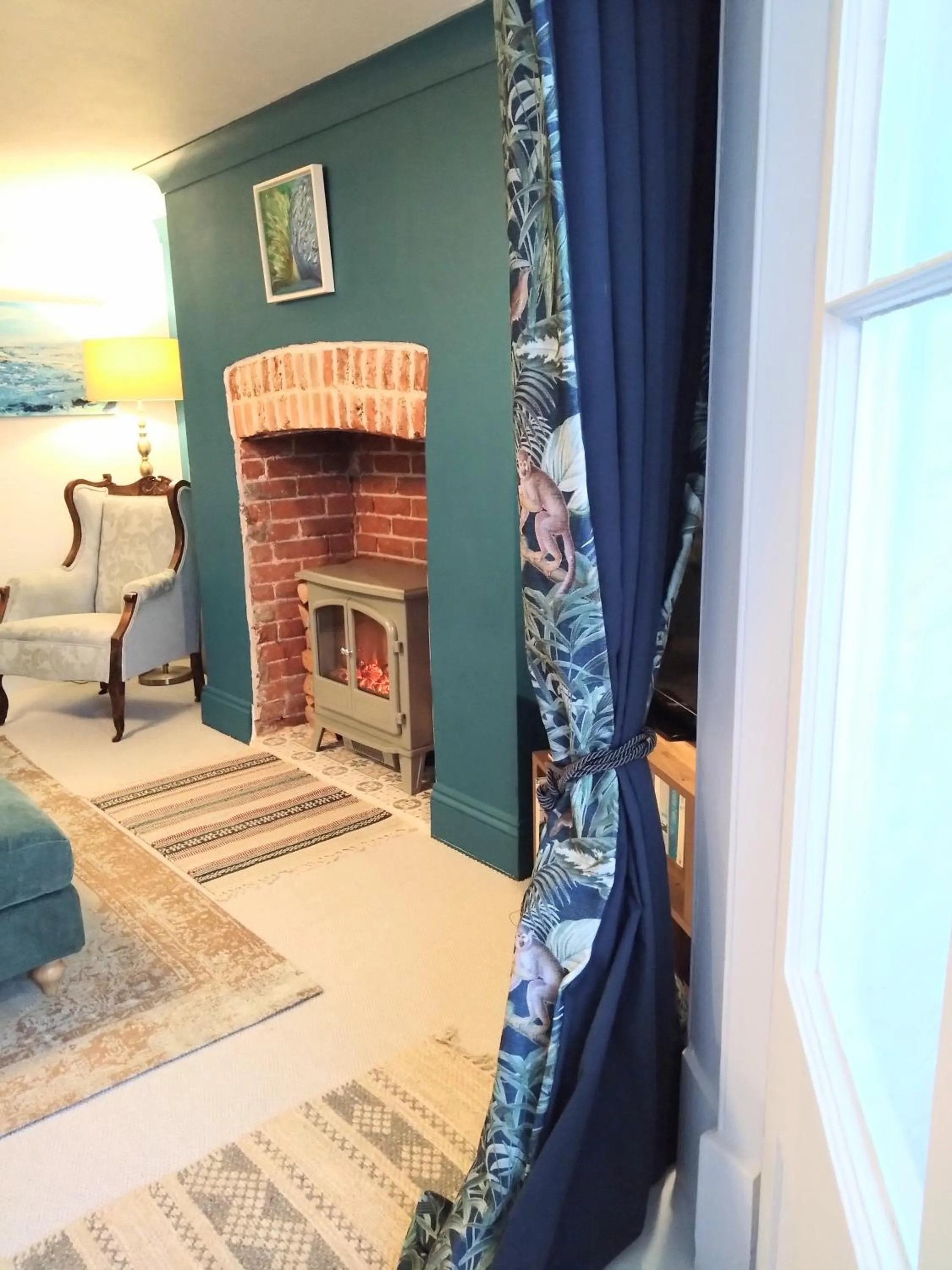 Living room, Bed in Beachfront Studio Apartment