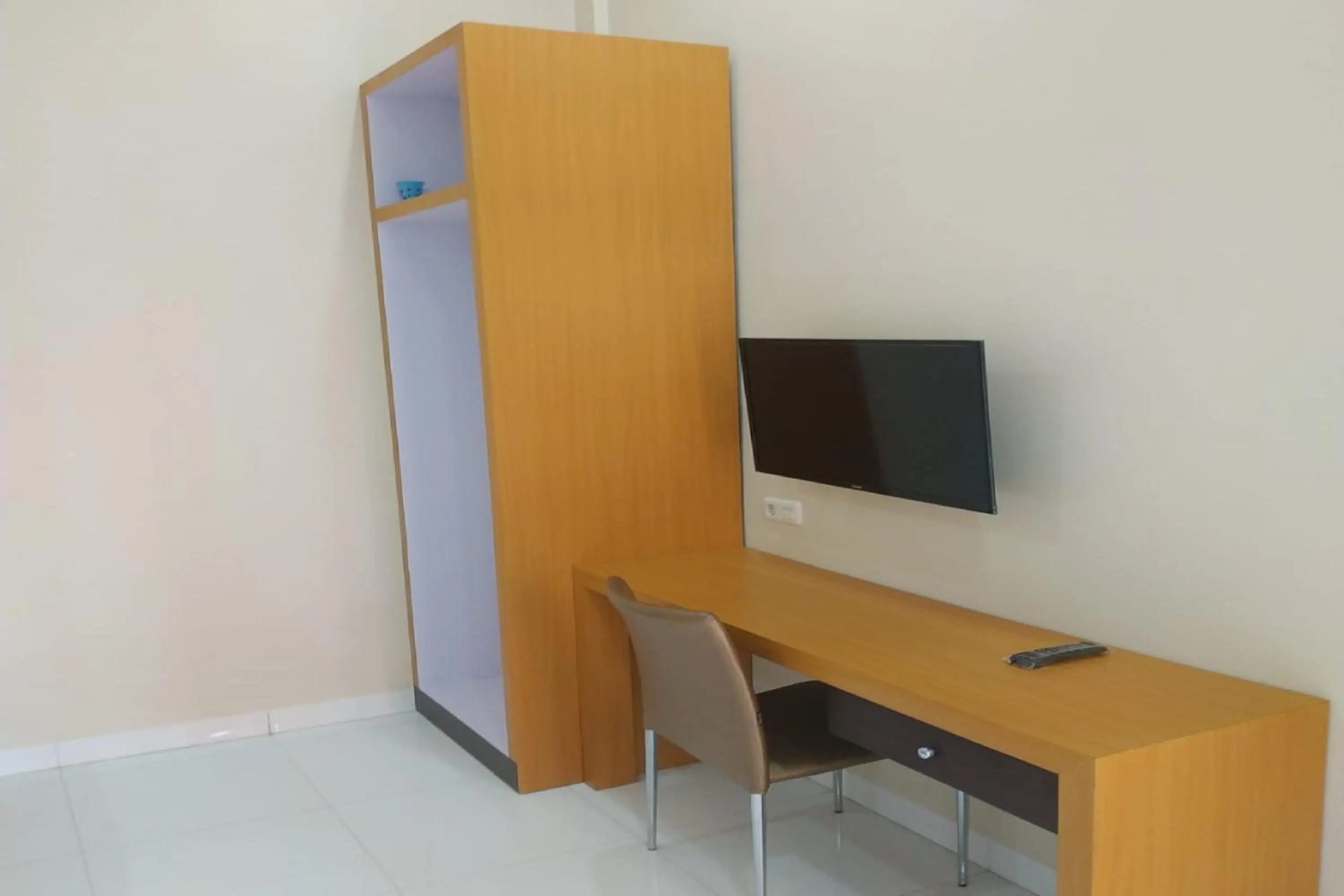 Bedroom in Nietsa Guest House Palu RedPartner