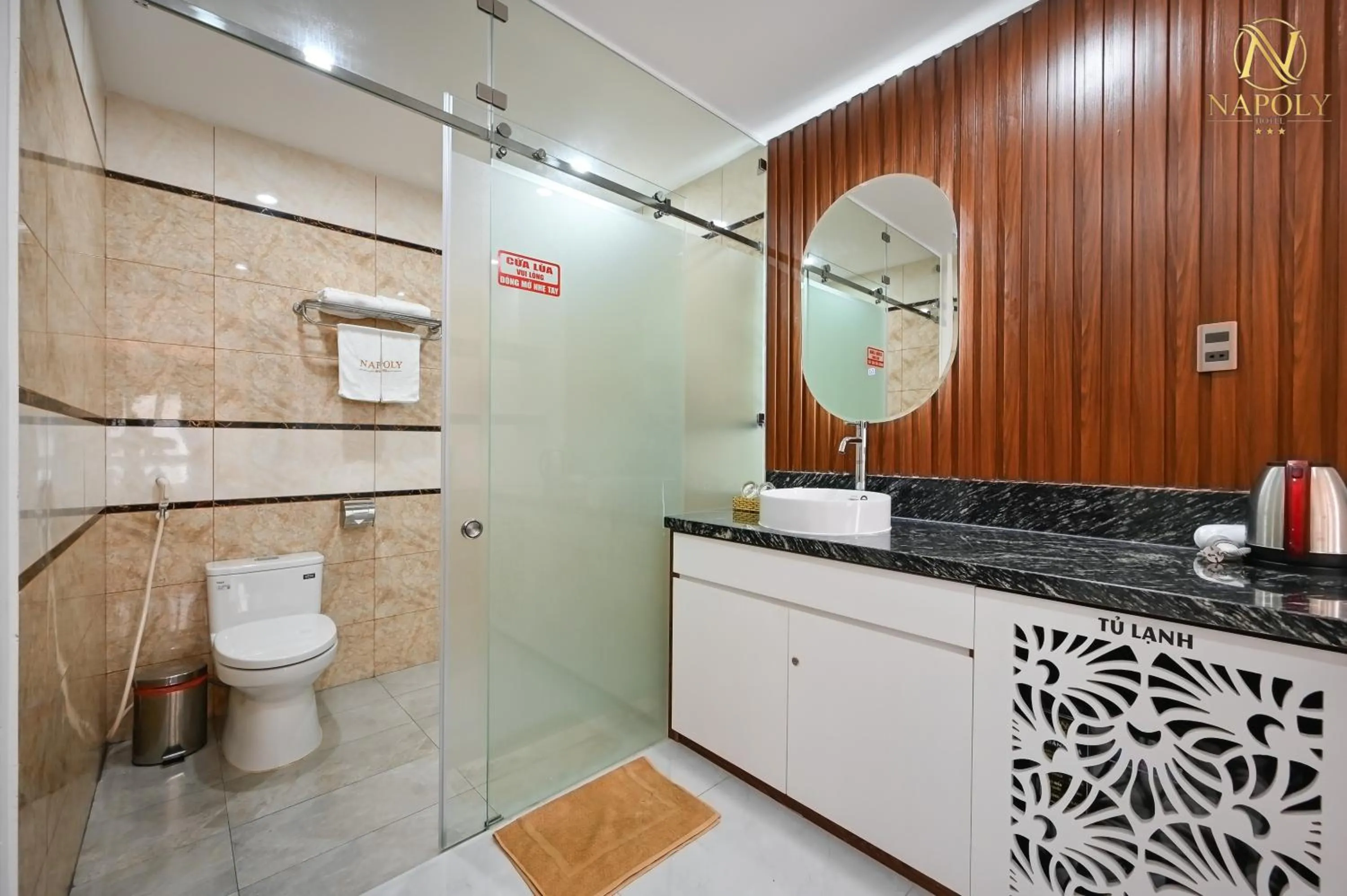 Bathroom in Napoly Hotel