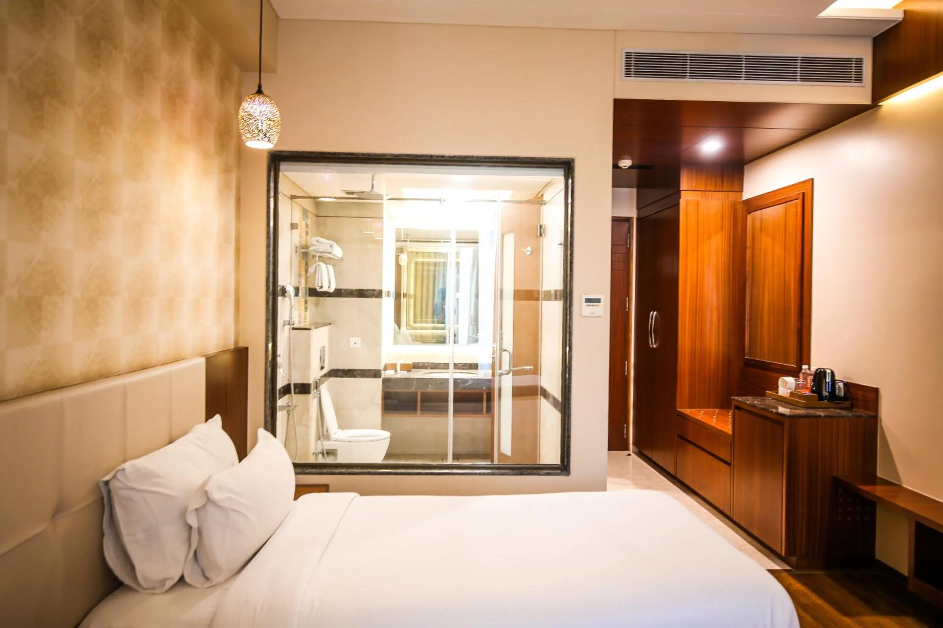 Bed in Pristine Hotel, Varanasi