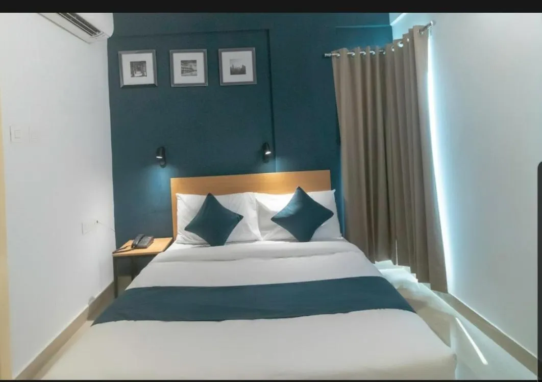 Bed in Hotel Mayfair Tower