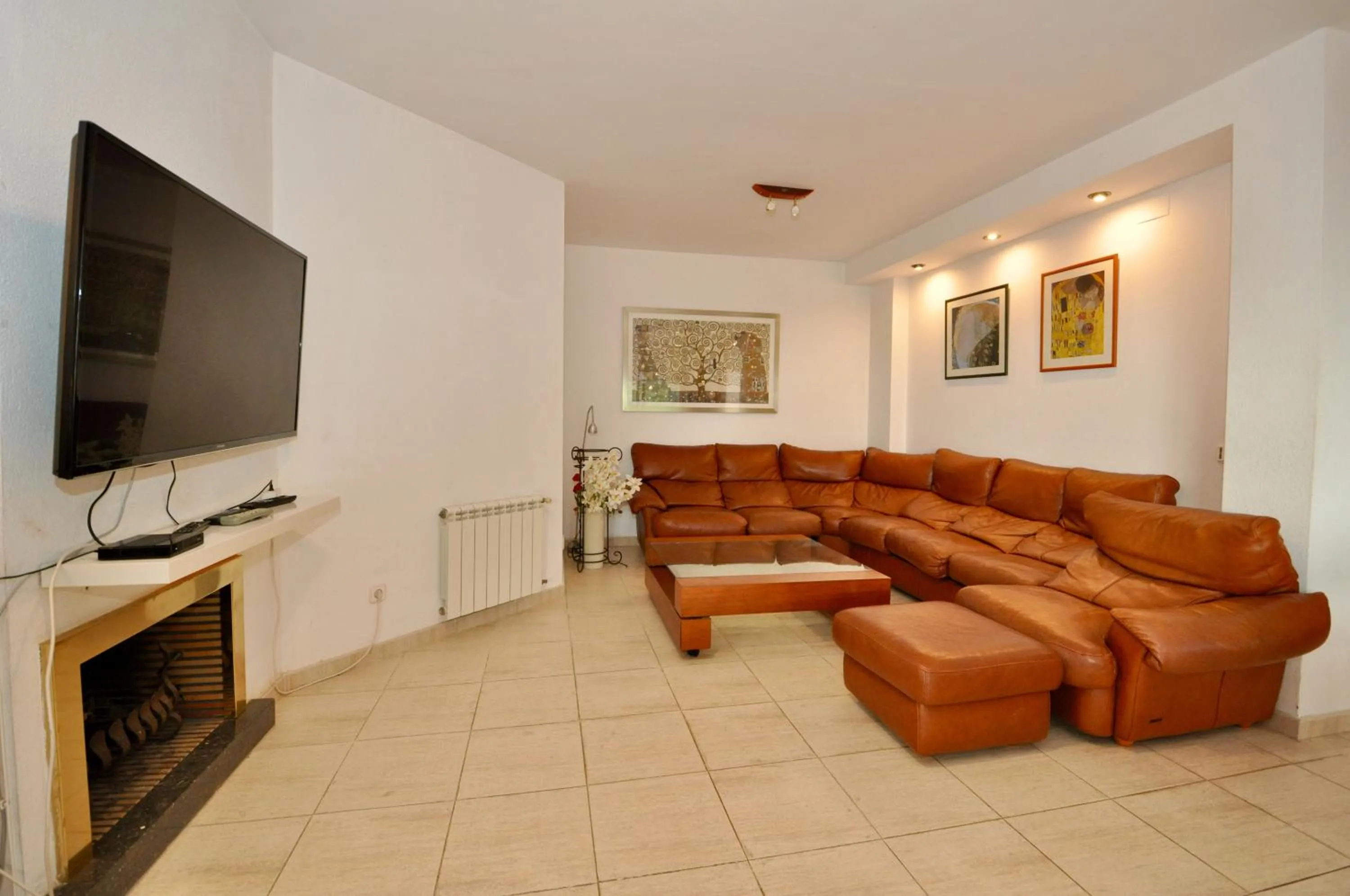Communal lounge/ TV room in Villa Talia