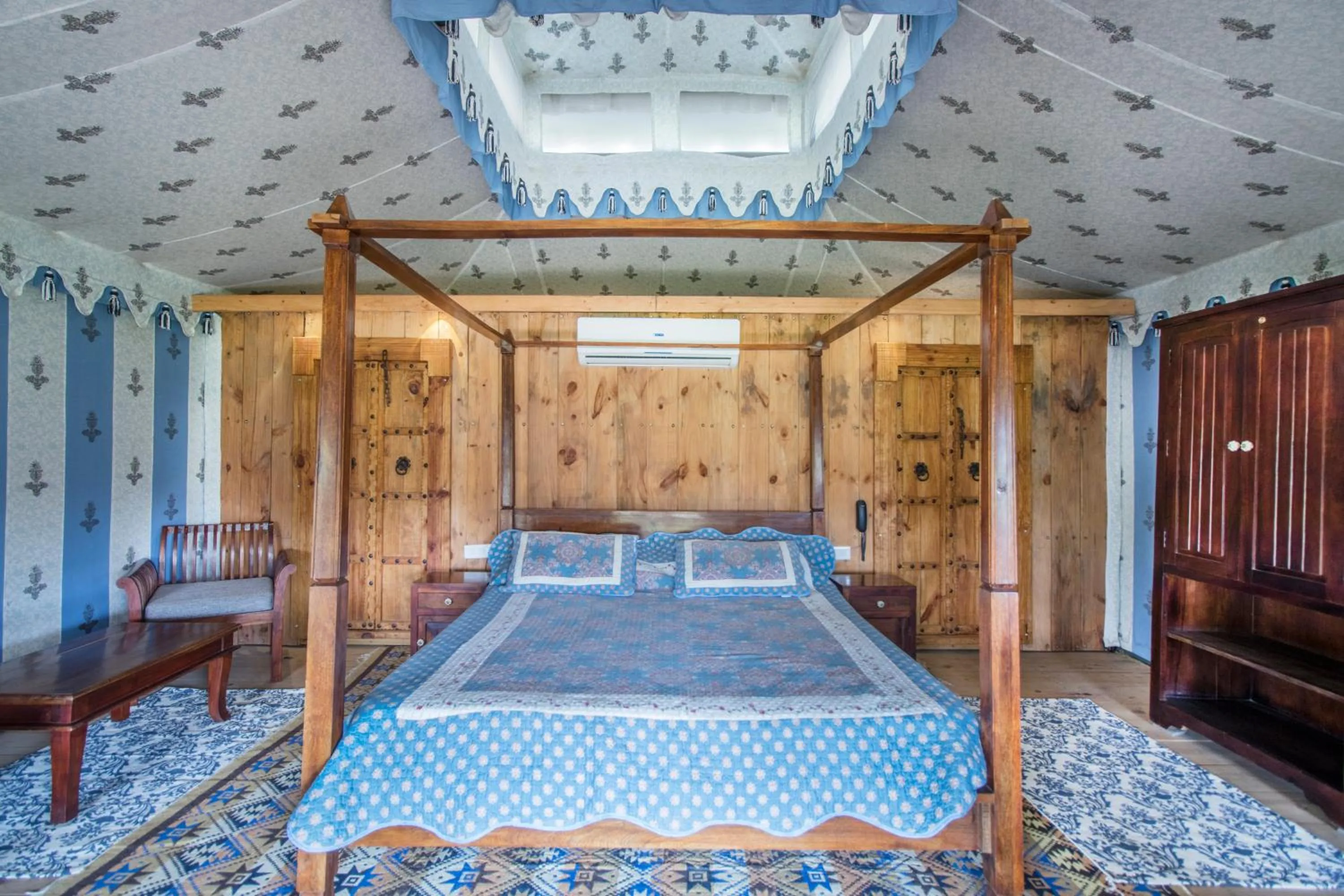 Bed in Maa Ashapura Resort