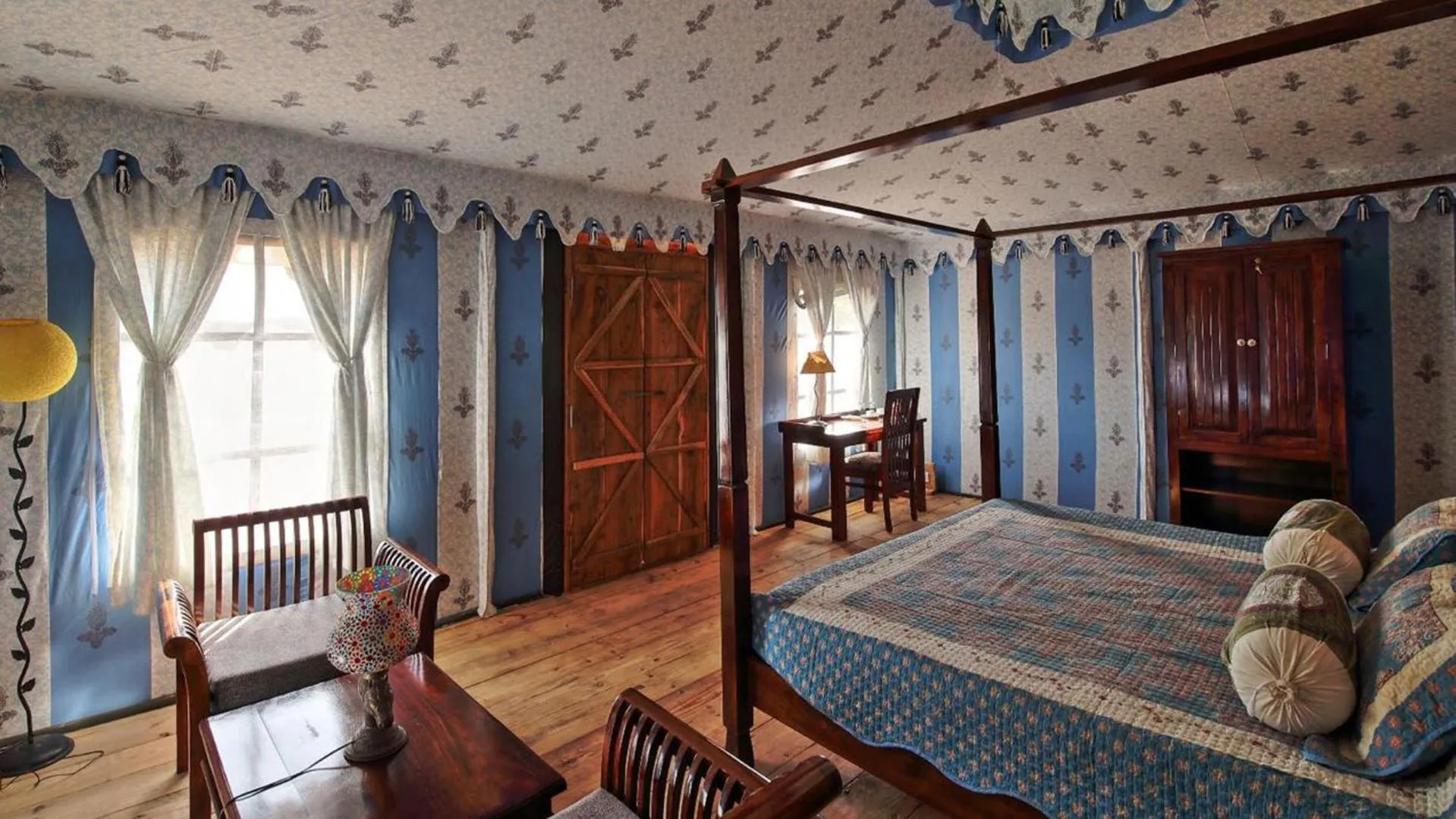 Bed in Maa Ashapura Resort