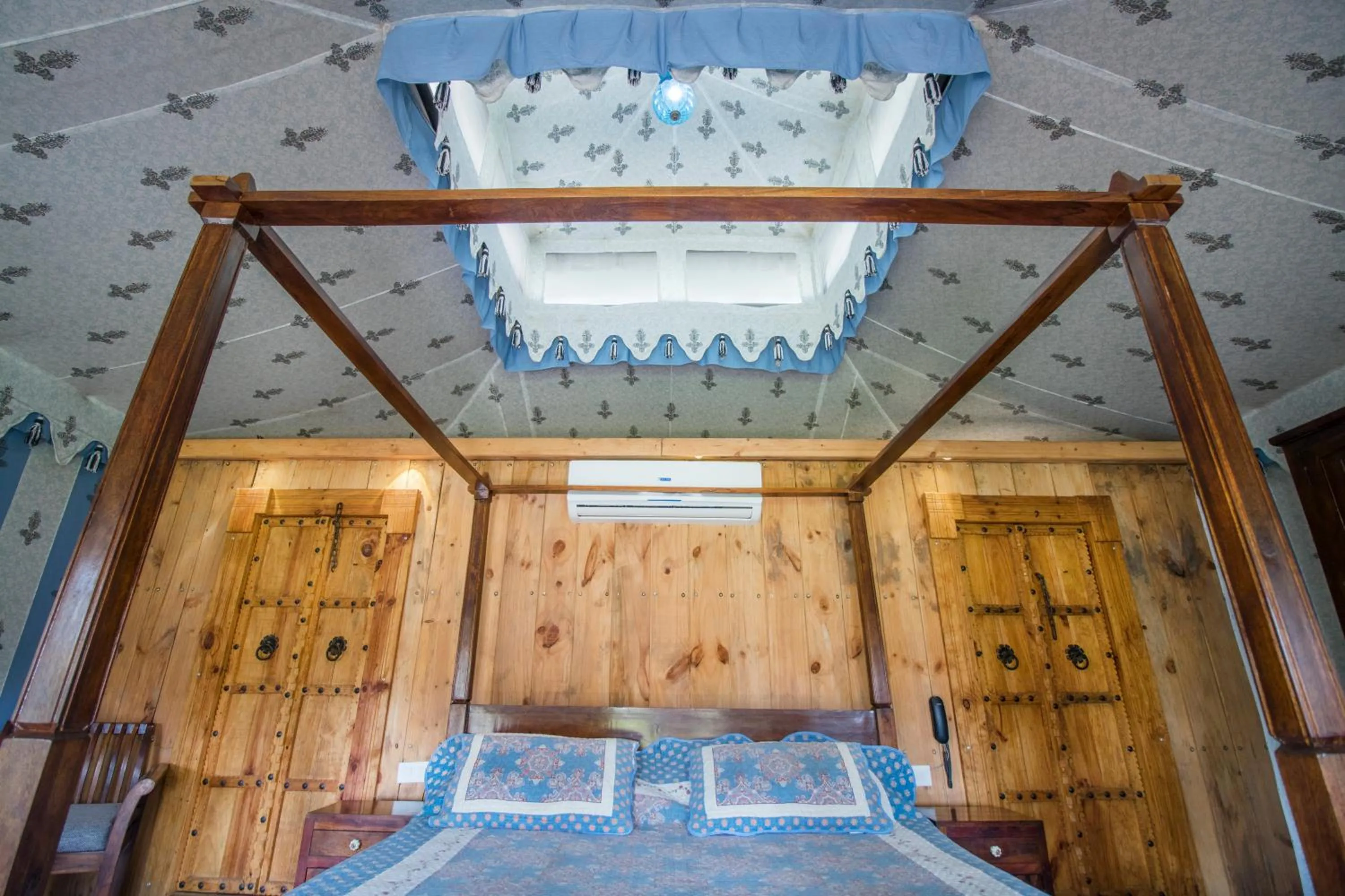 Bed in Maa Ashapura Resort