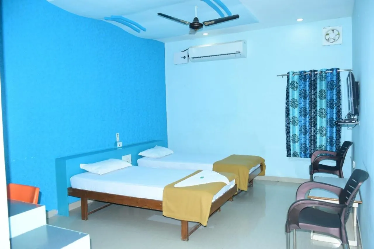 Bed in Hotel Uma Executive Lodging