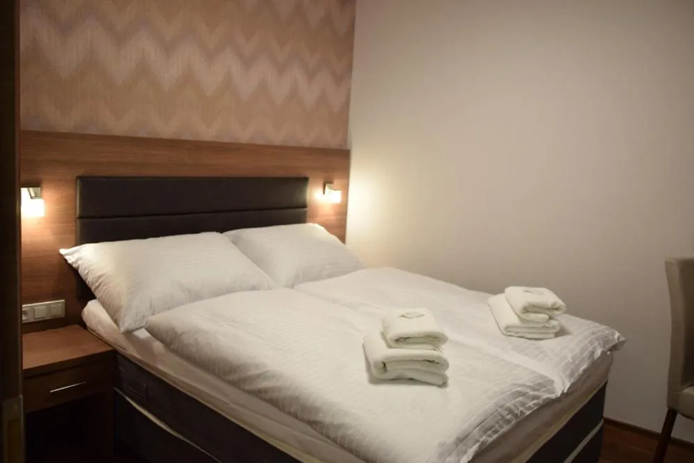 Bed in Hotel Prague Star