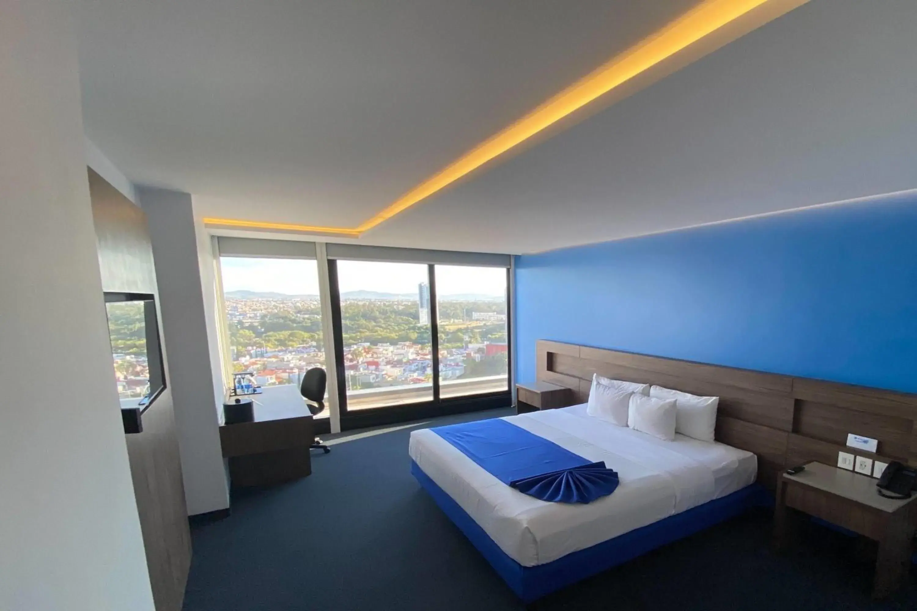 Photo of the whole room, Bed in Wyndham Puebla Angelopolis Photo of the whole room, Bed in Wyndham Puebla Angelopolis