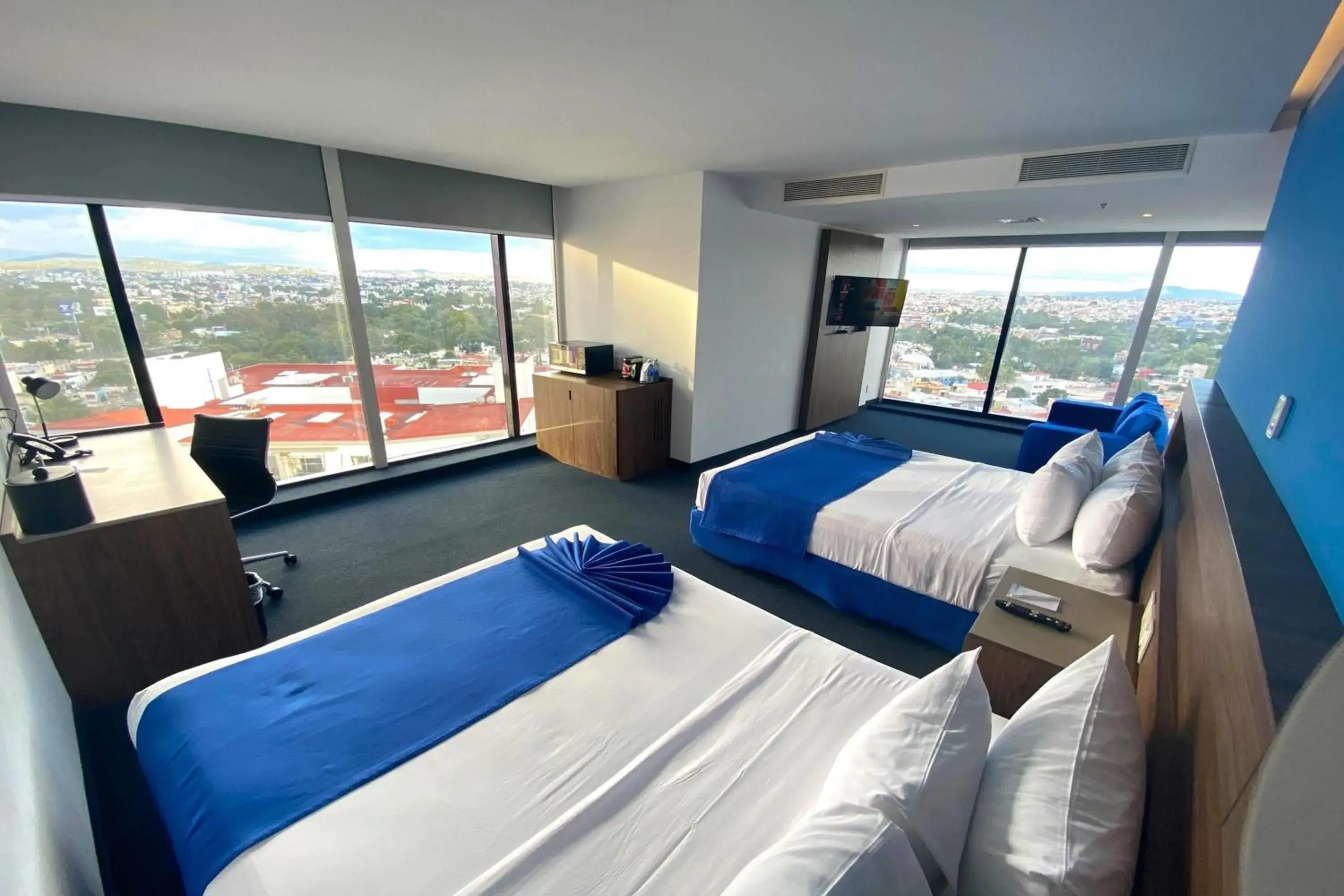 Photo of the whole room, Bed in Wyndham Puebla Angelopolis Photo of the whole room, Bed in Wyndham Puebla Angelopolis