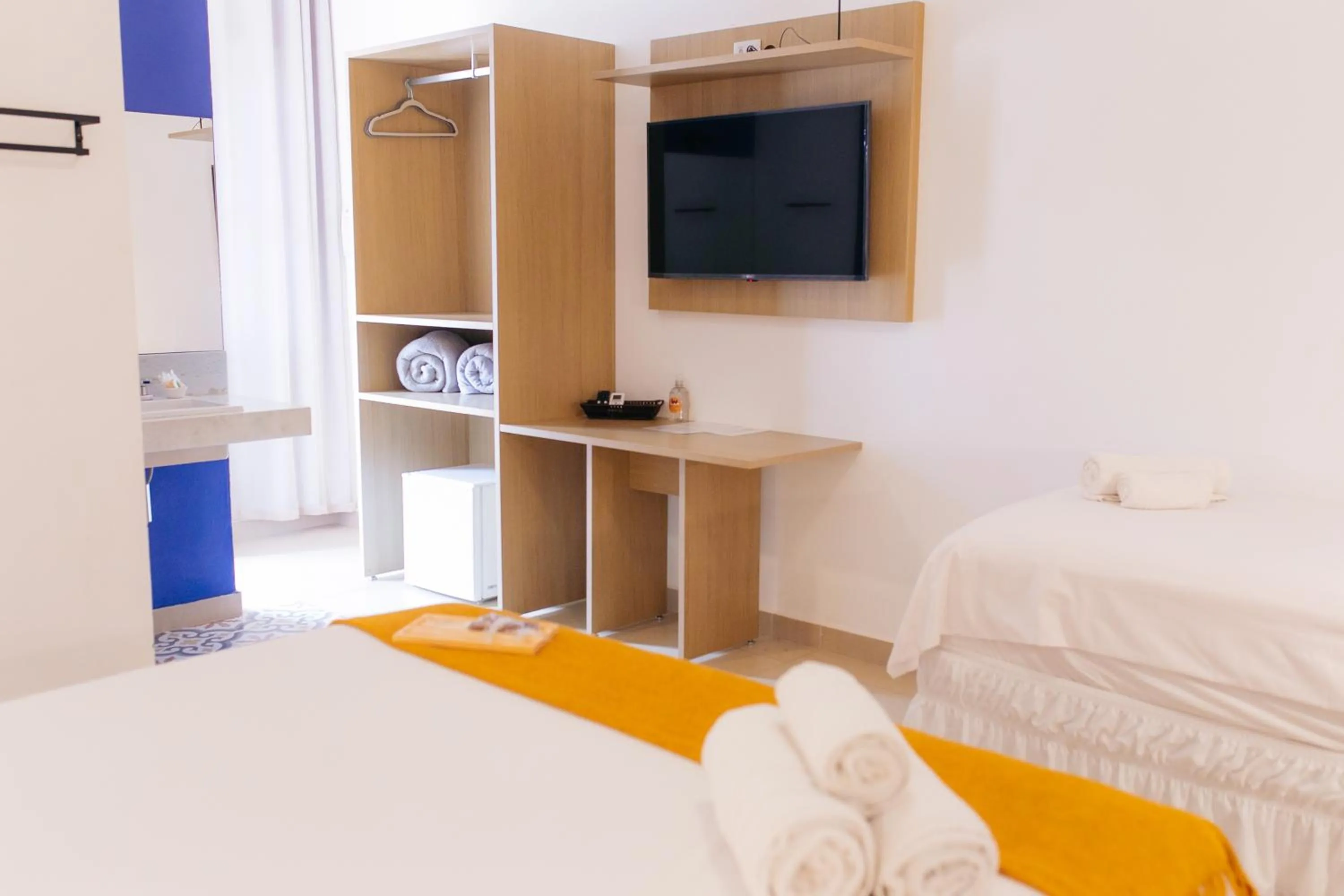 Bed in Pousada Relicário