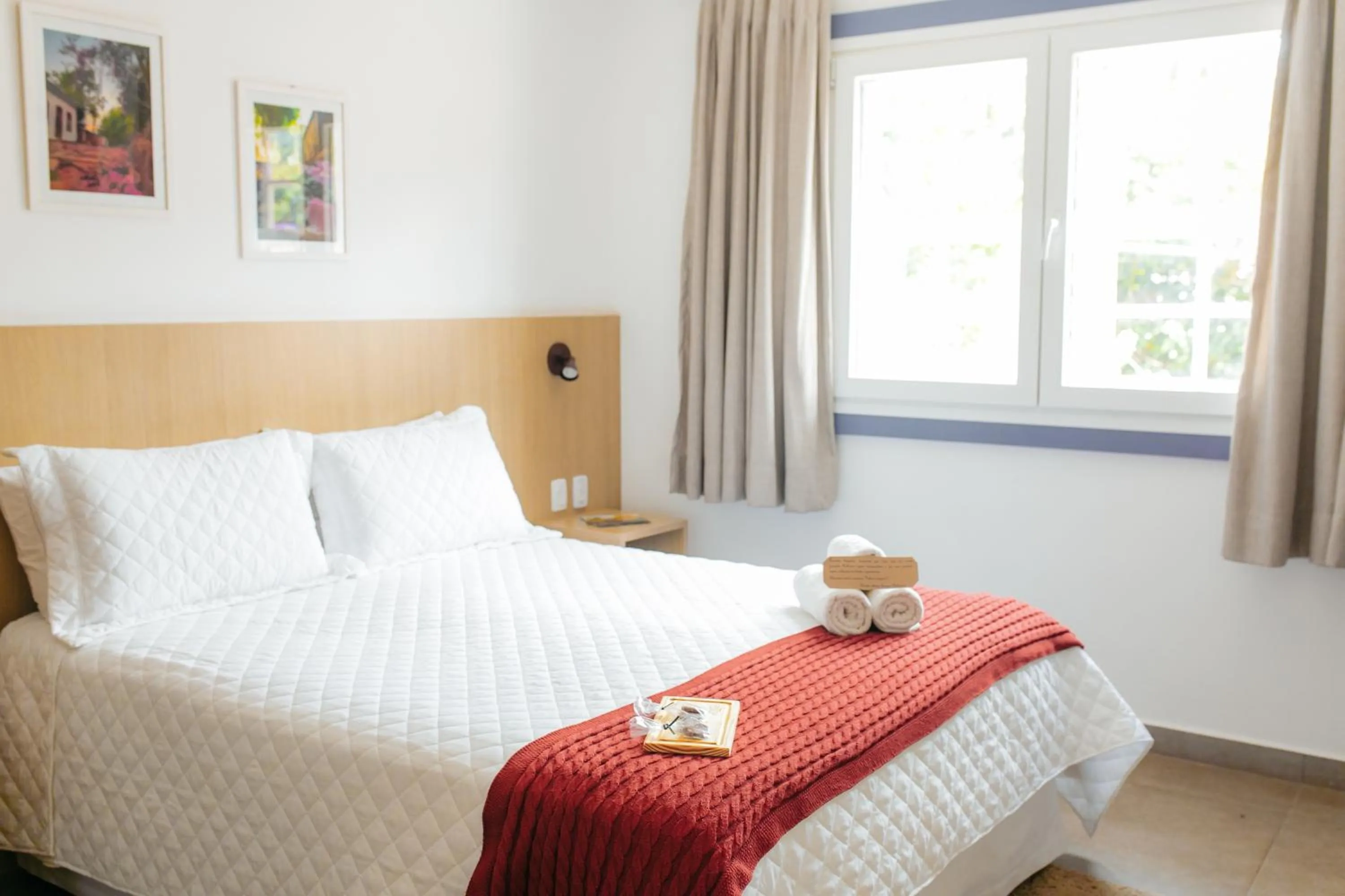 Bed in Pousada Relicário