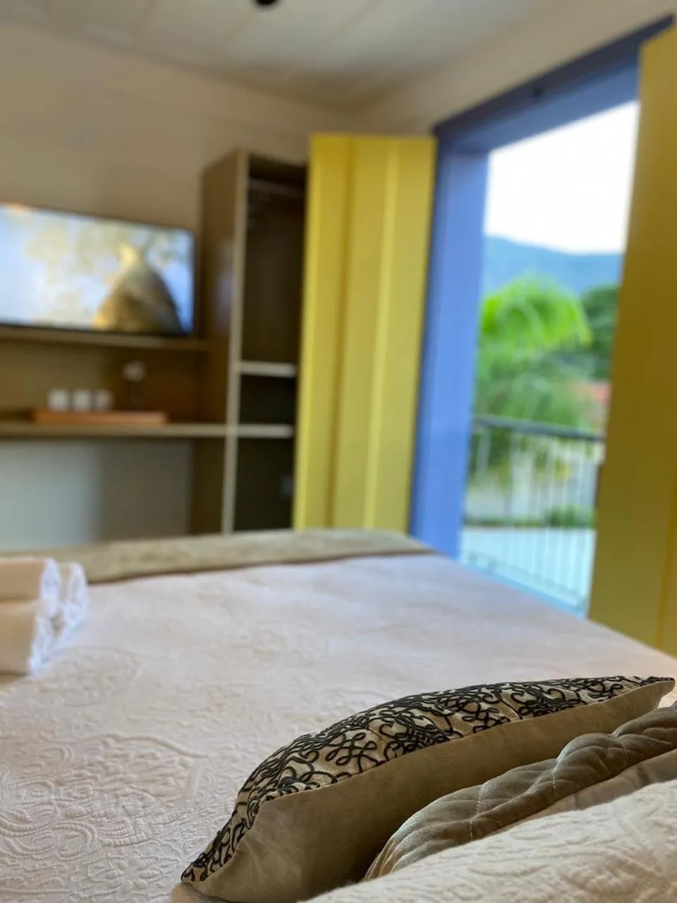 Bed in Pousada Relicário