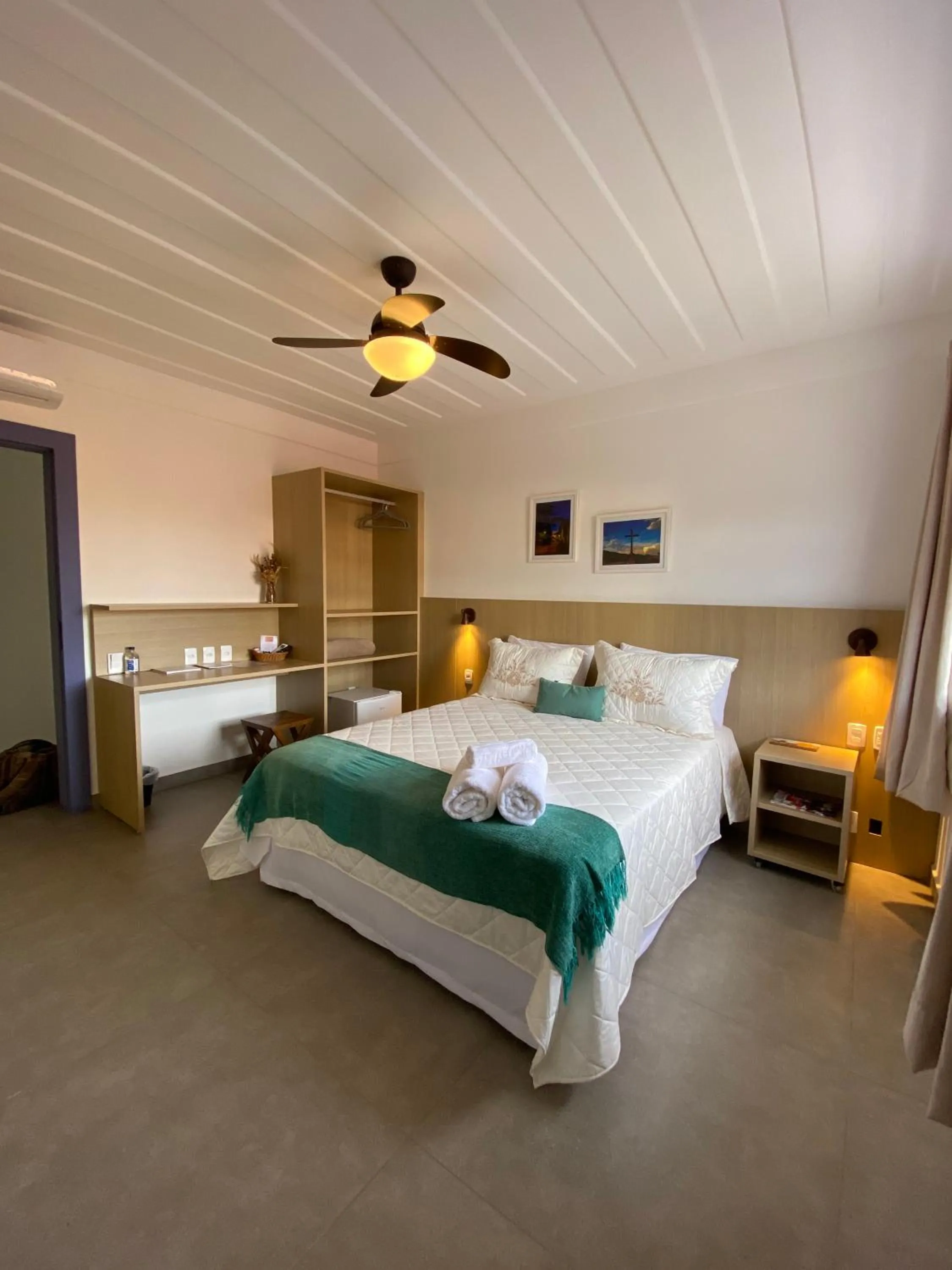 Bed in Pousada Relicário