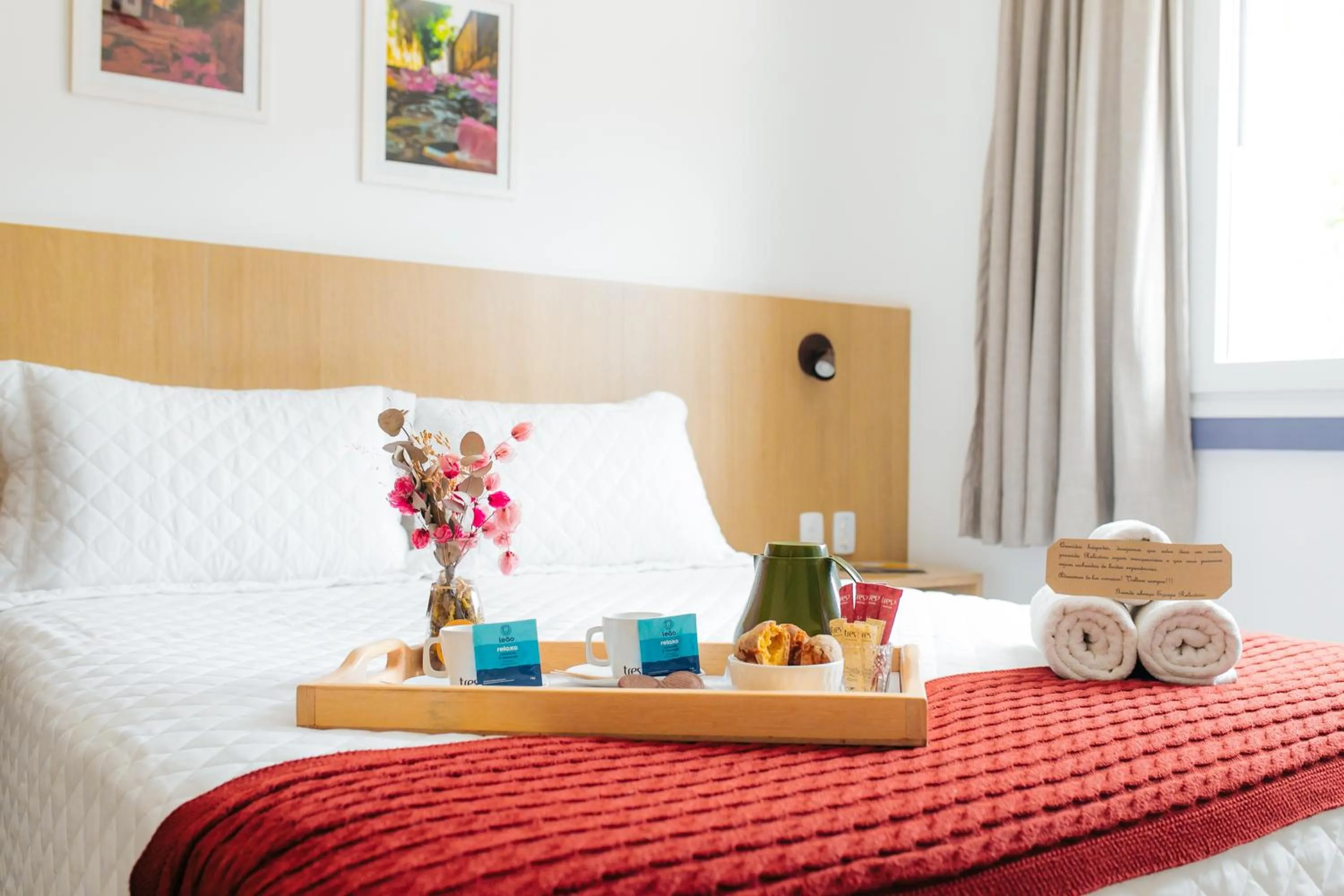 Bed in Pousada Relicário