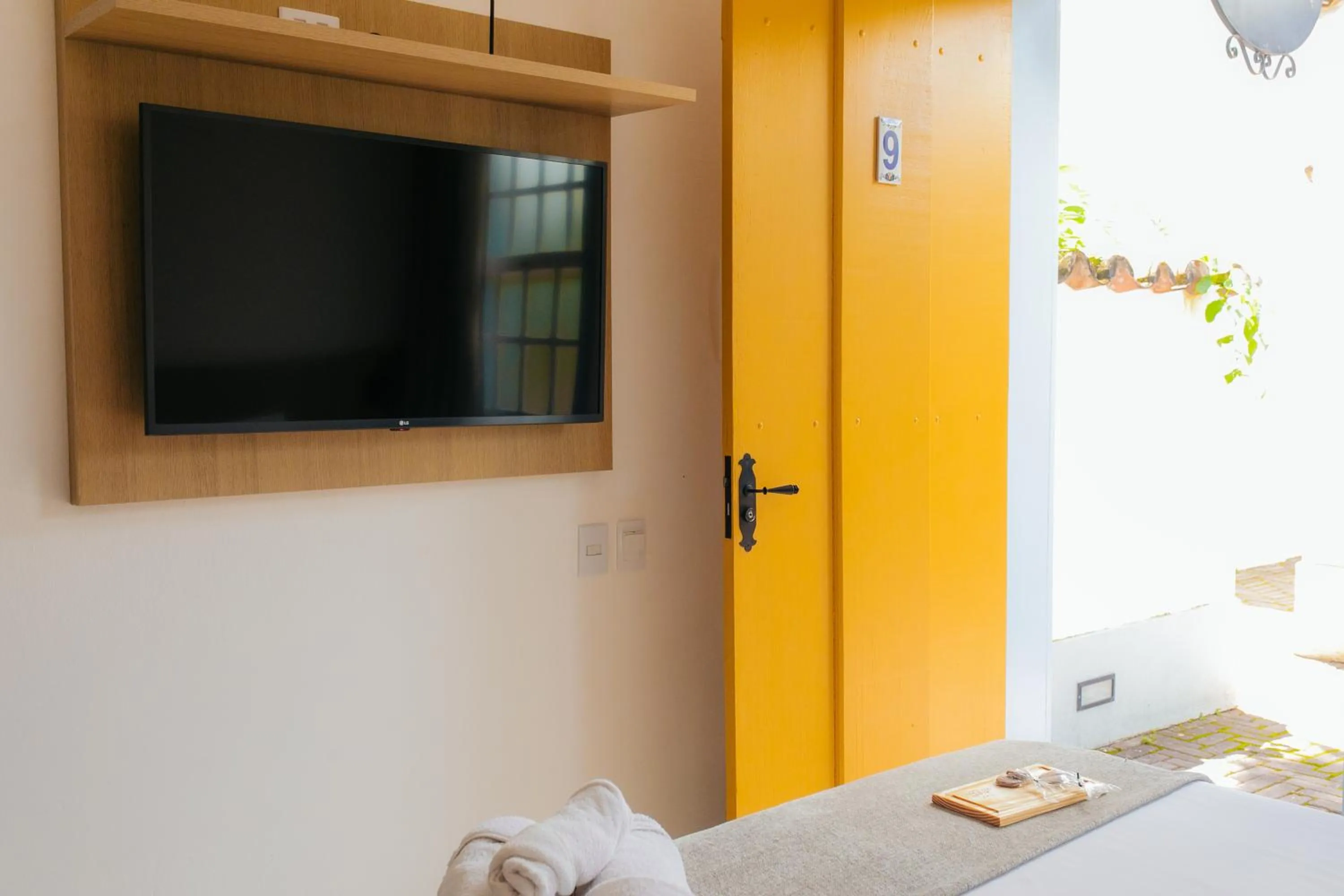 Bed in Pousada Relicário