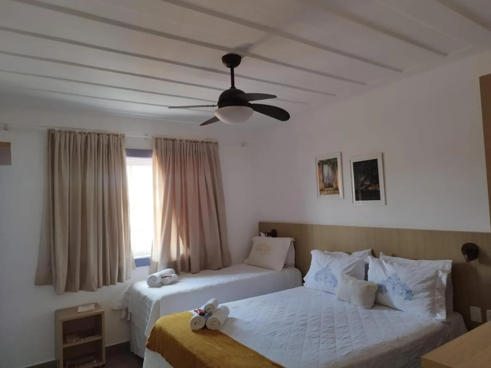 Bed in Pousada Relicário