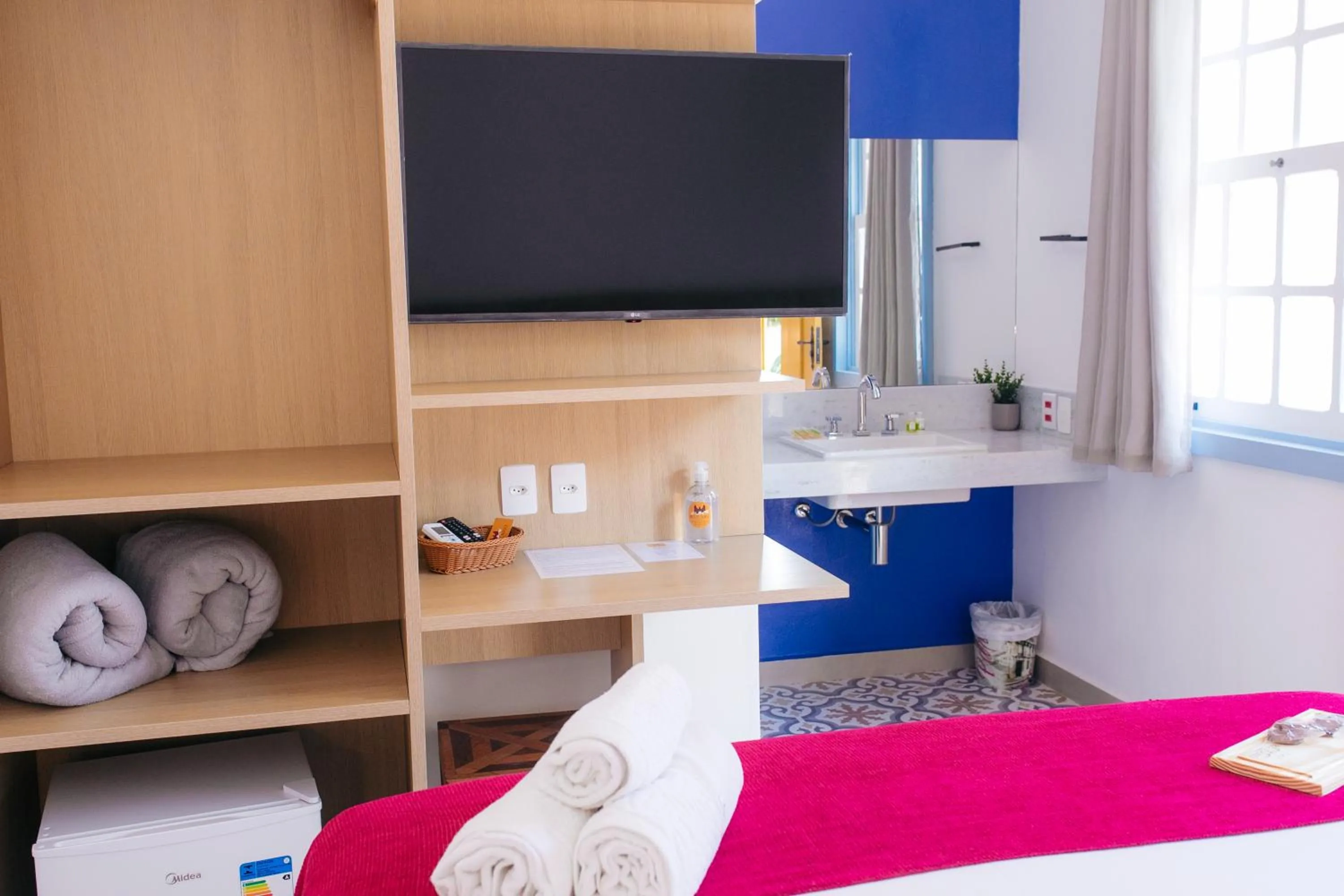 Bed in Pousada Relicário