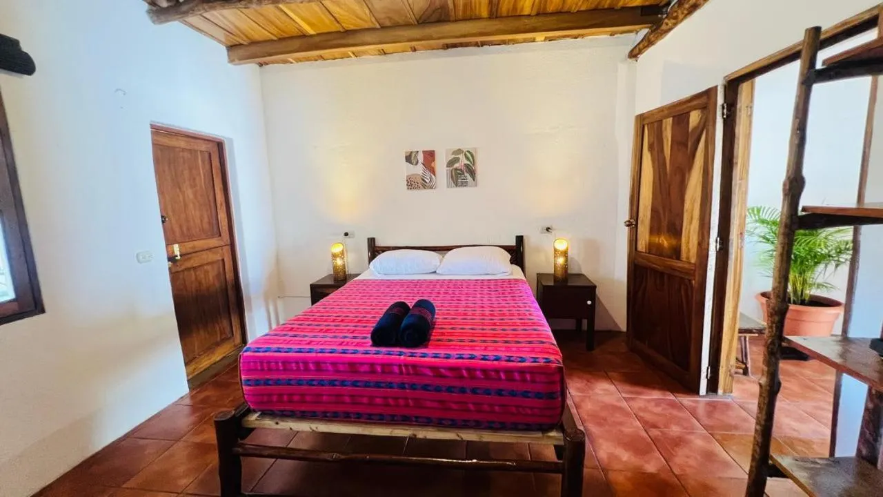 Bed in Paredon Surf House